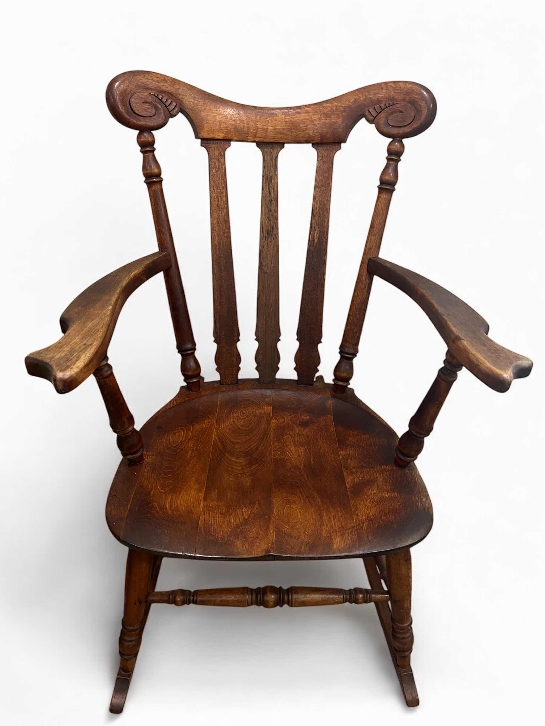 Photo 1 of VINTAGE WOODEN ROCKING CHAIR. 