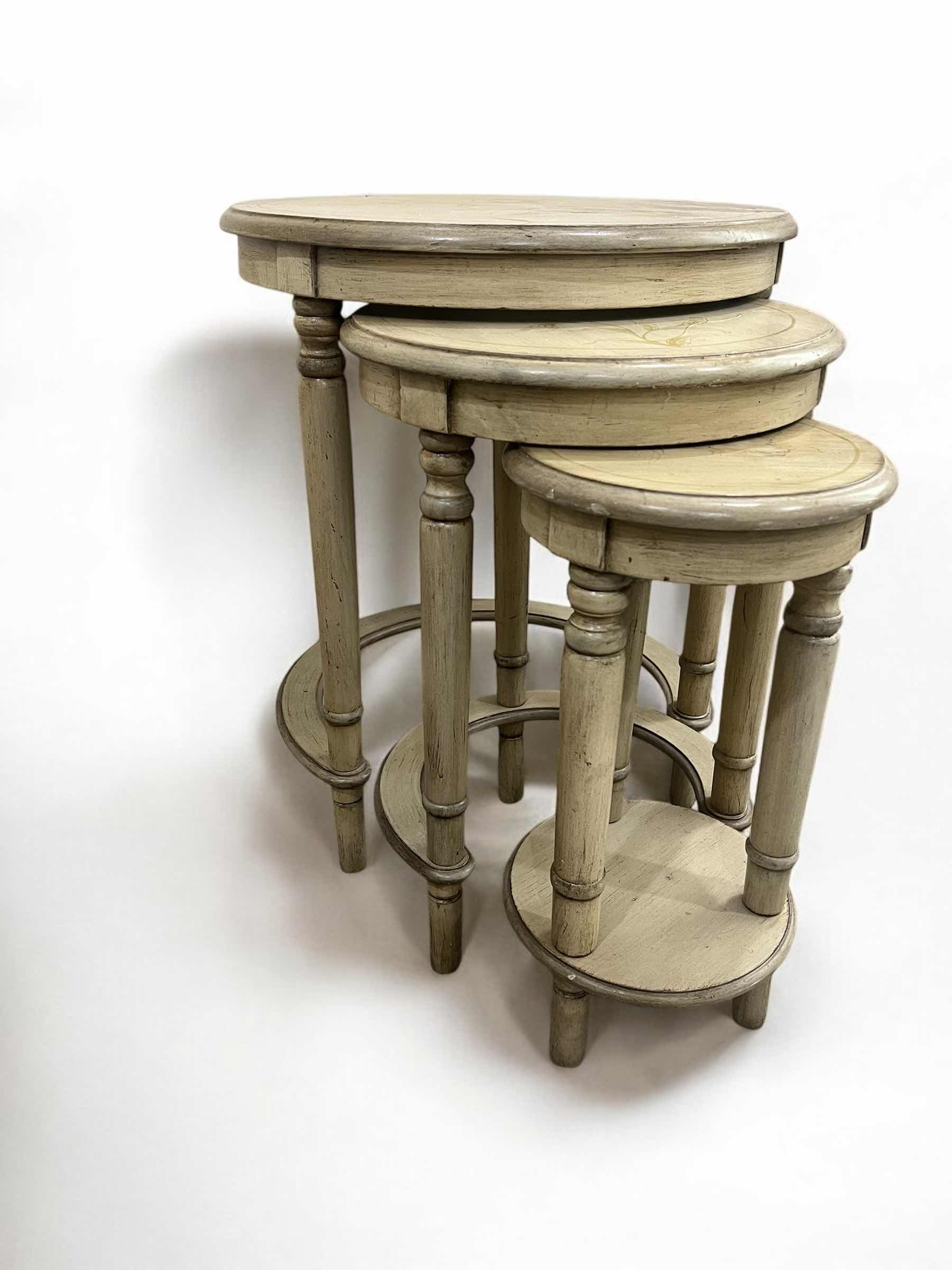 Photo 1 of VINTAGE STYLE ROUND NESTING TABLES. FLORAL PATTERN, SMALLEST HEIGHT IS 16", LARGEST IS 24"H.