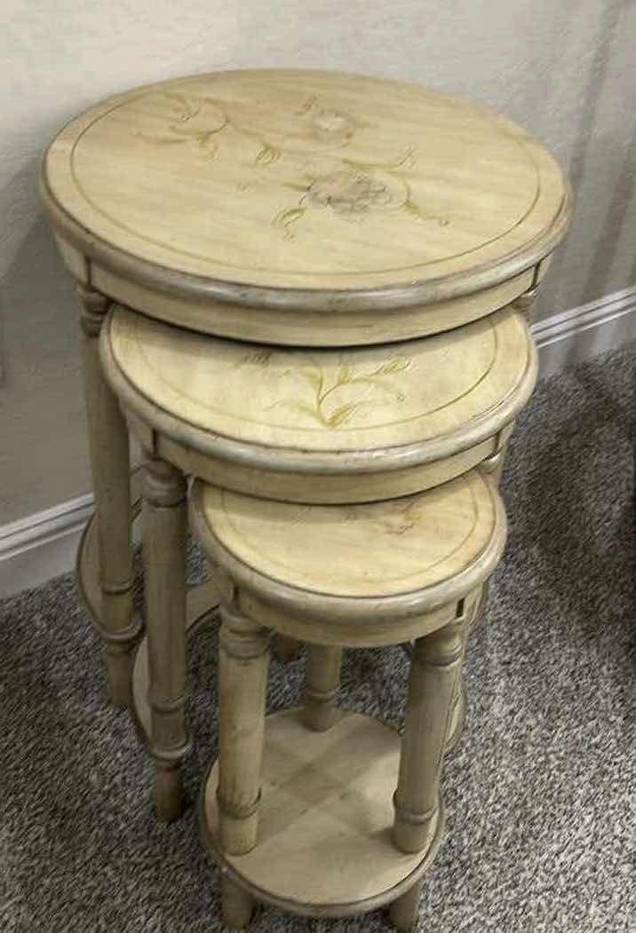 Photo 1 of VINTAGE STYLE ROUND NESTING TABLES. FLORAL PATTERN, SMALLEST HEIGHT IS 16", LARGEST IS 24"H.