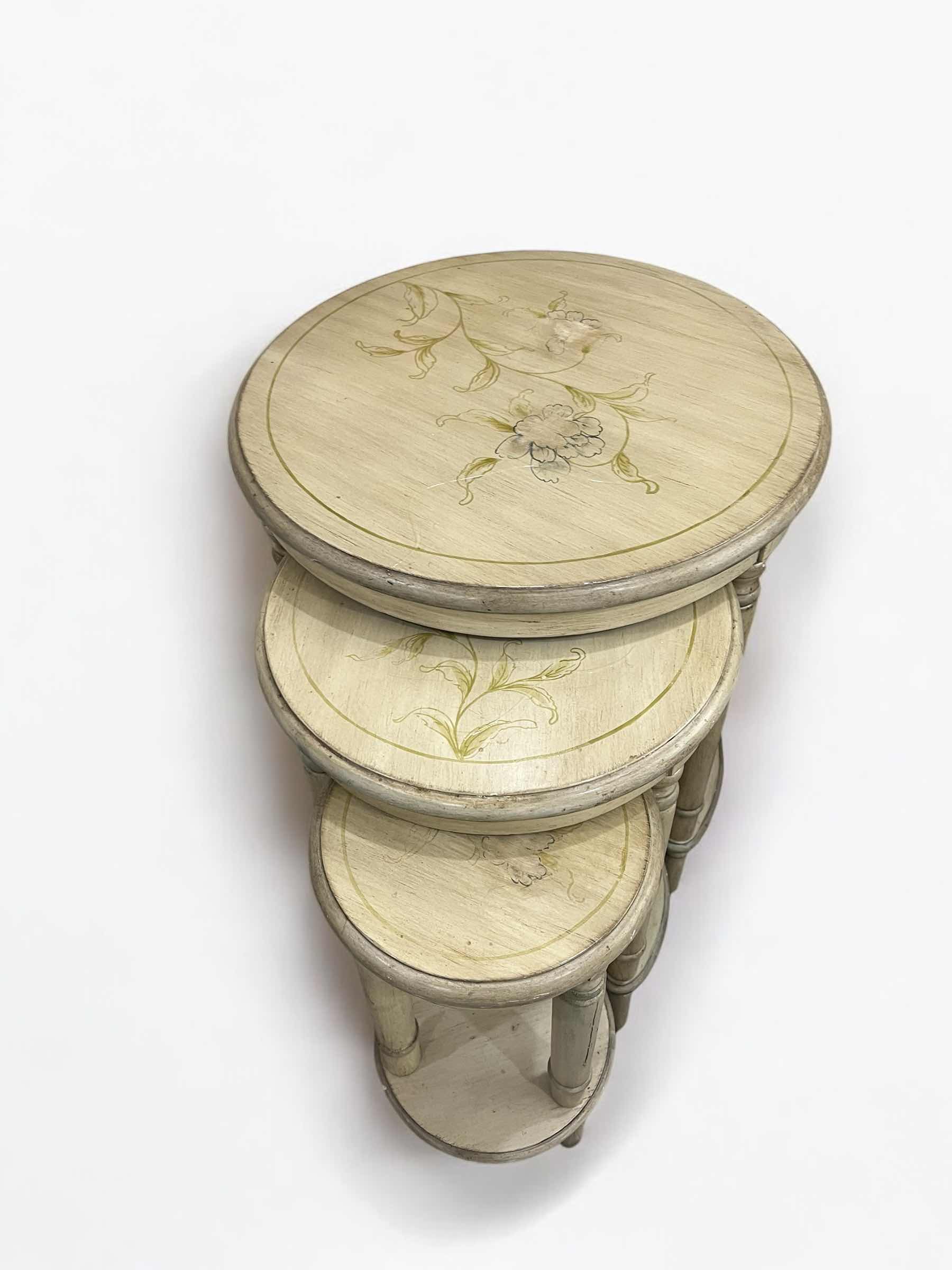 Photo 1 of VINTAGE STYLE ROUND NESTING TABLES. FLORAL PATTERN, SMALLEST HEIGHT IS 16", LARGEST IS 24"H.