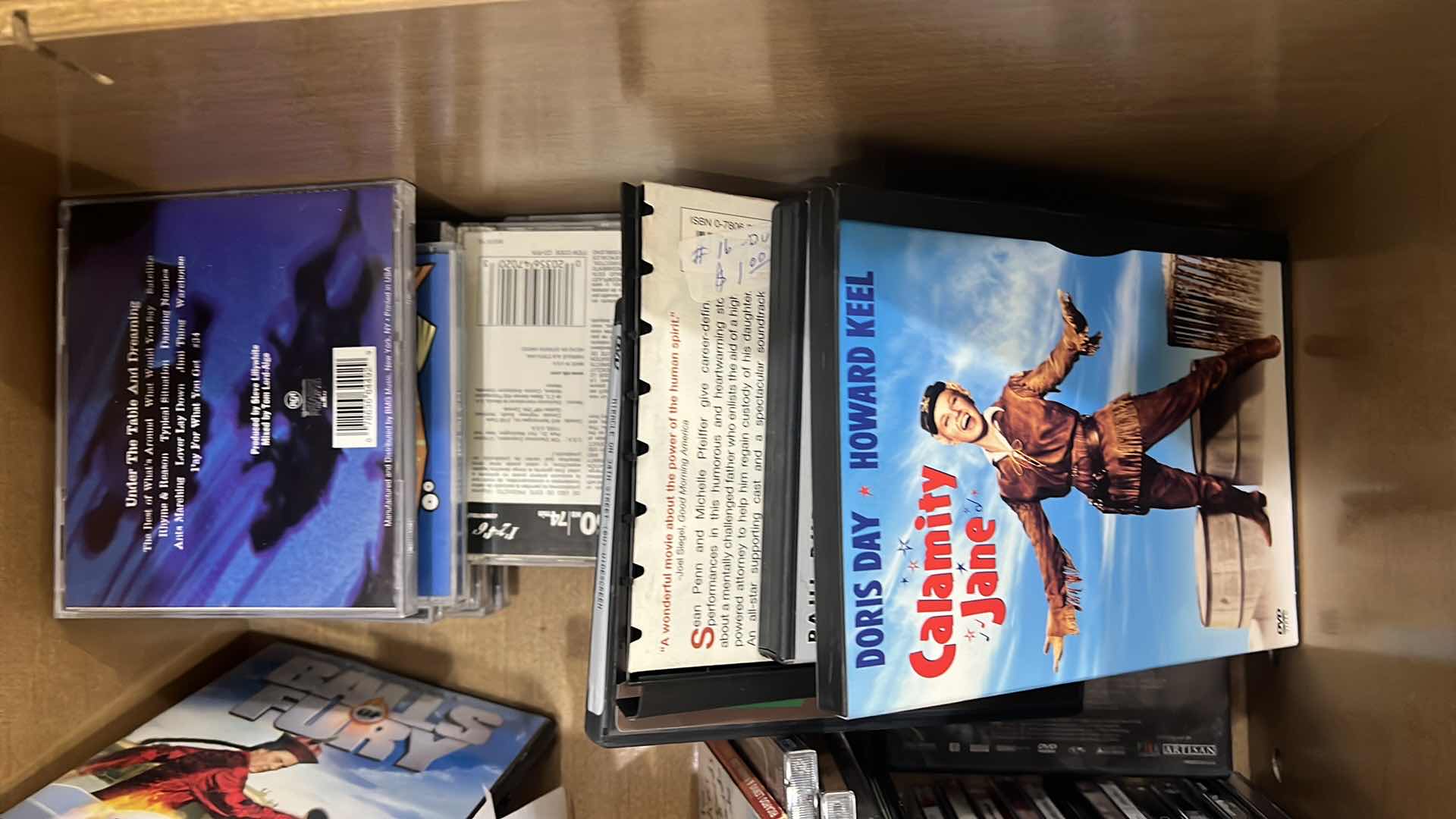 Photo 1 of CONTENTS OF OFFICE DRAWER. CDS DVD’ AND MISC ITEMS.