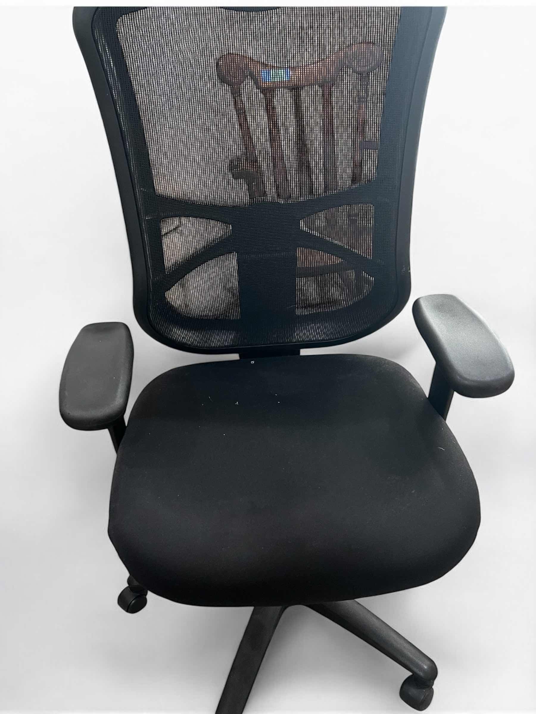Photo 1 of BLACK SWIVEL AND HEIGHT ADJUSTABLE  OFFICE CHAIR.