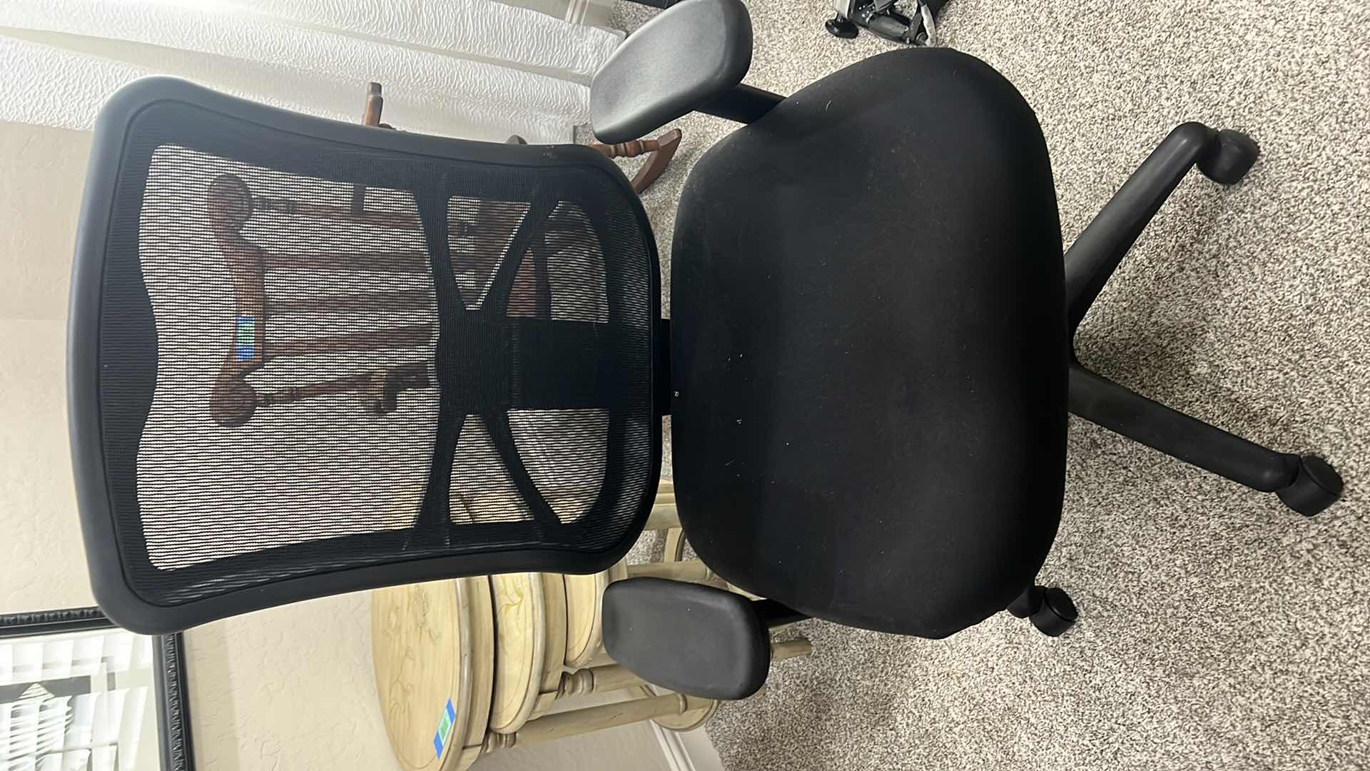 Photo 1 of BLACK SWIVEL AND HEIGHT ADJUSTABLE  OFFICE CHAIR.