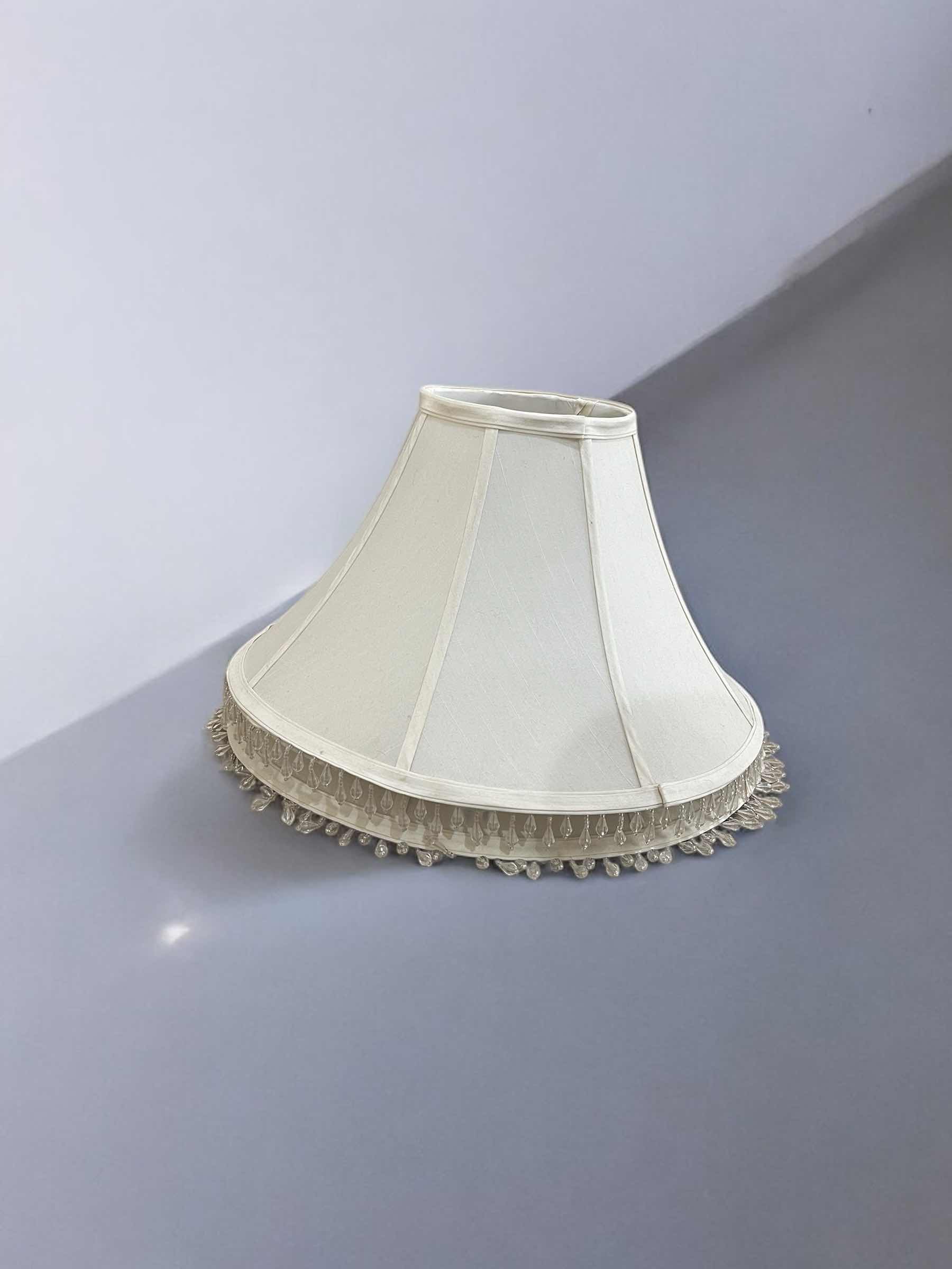 Photo 1 of 2-OFF WHITE LAMPSHADES WITH BEADED HANGING TASSELS.