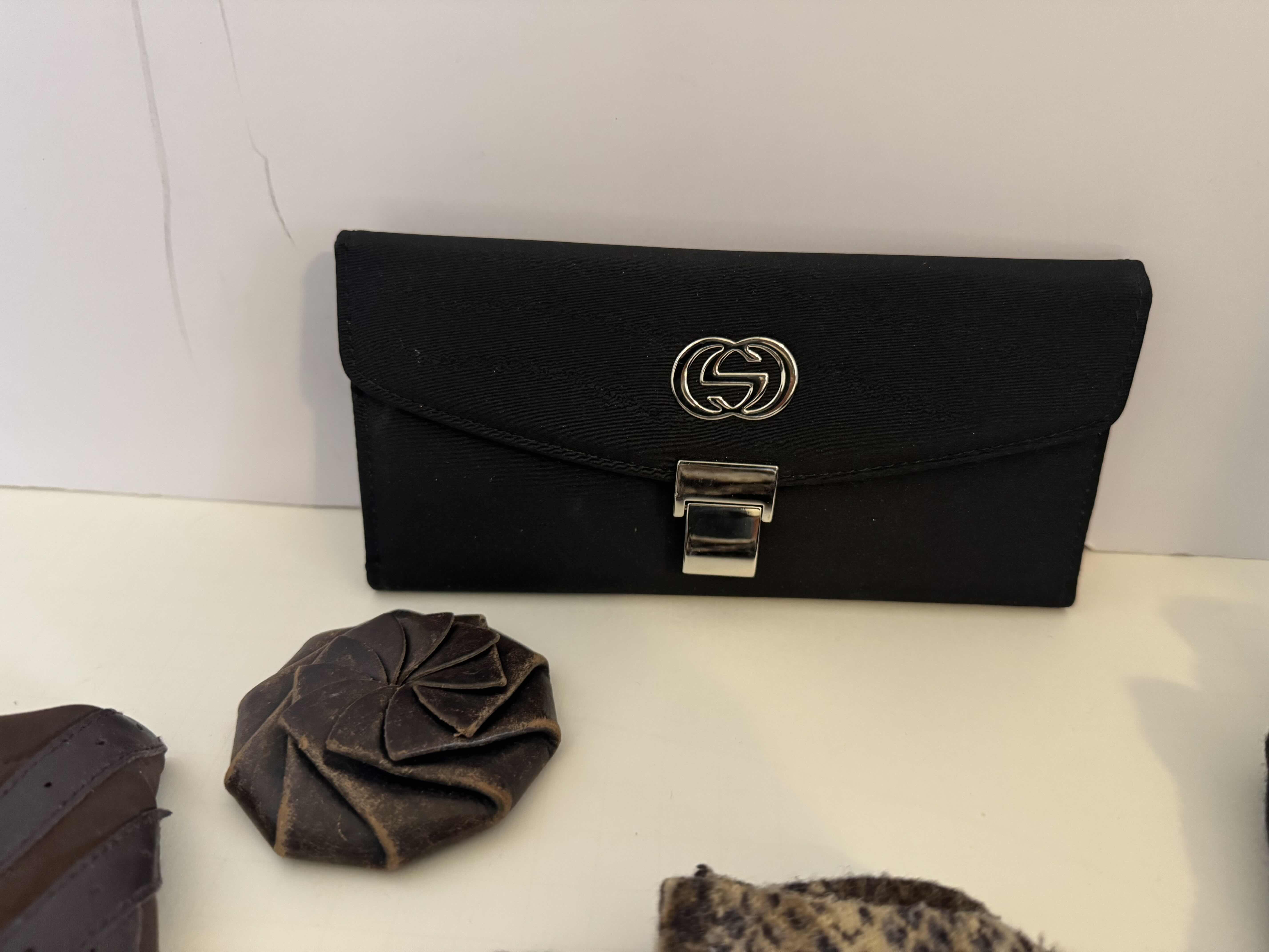 Photo 1 of WALLET, CHANGE PURSE AND (3) PAIRS OF GLOVES