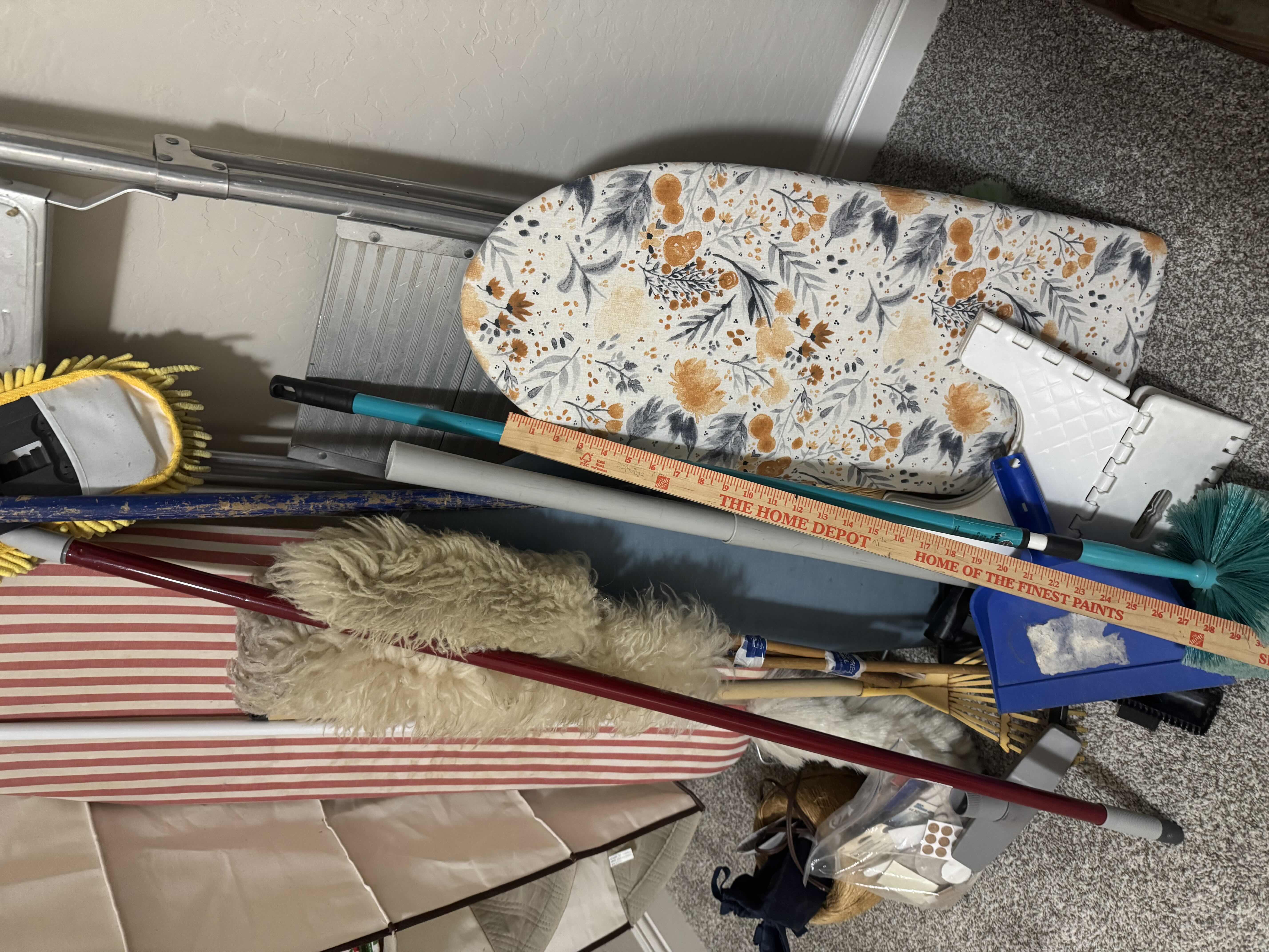 Photo 1 of CONTENTS OF CORNER: HANGING SHELF, STEP LADDER, STOOL, IRONING BOARD