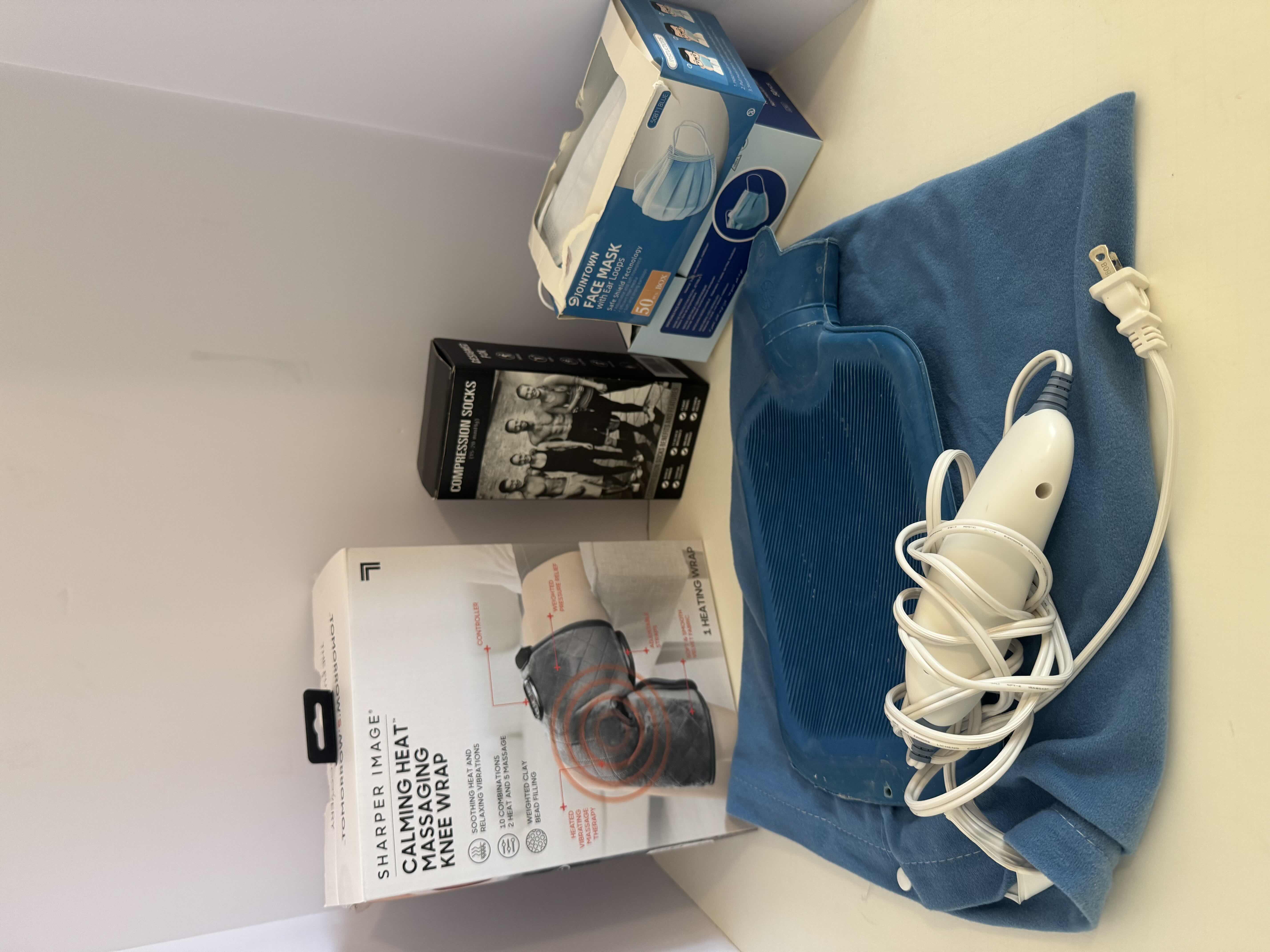 Photo 1 of MEDICAL SUPPLIES-HEATING PAD, WRAPS, & BOTTLES, COMPRESSION SOCKS, FACE MASKS, ETC