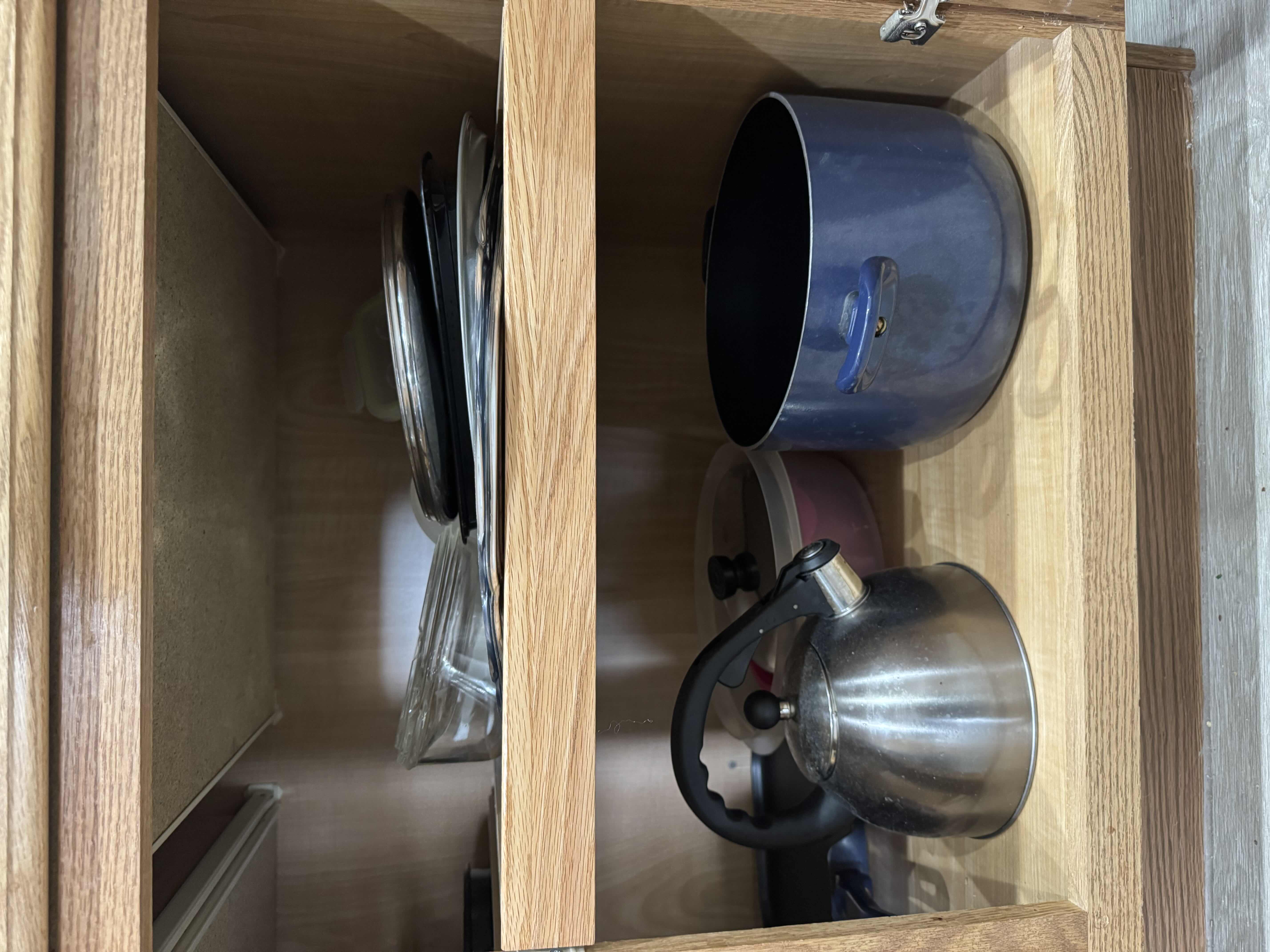 Photo 1 of CONTENTS OF KITCHEN CABINET, POTS AND PANS.