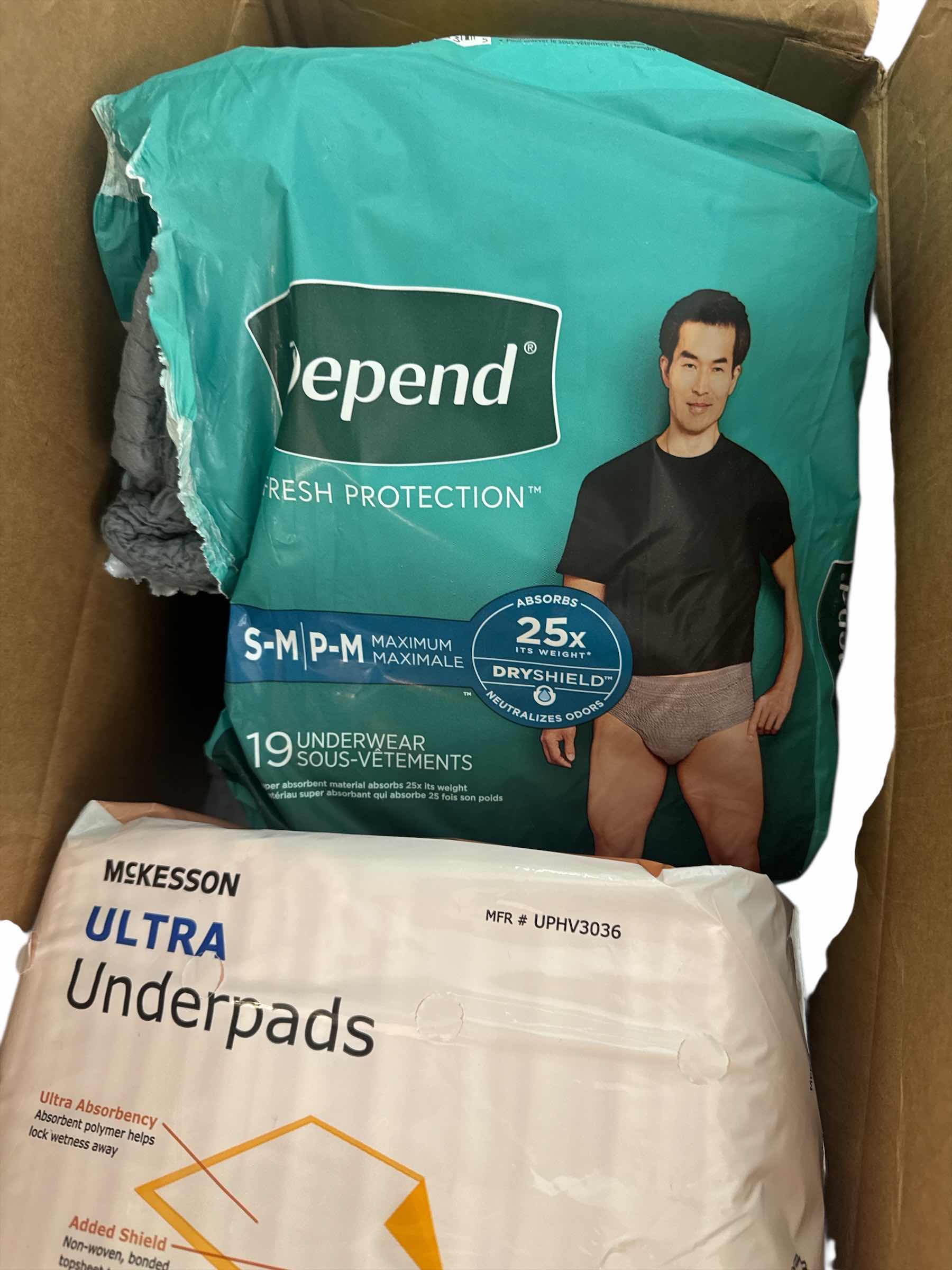 Photo 1 of 2 BOXES OF INCONTINENCE SUPPLIES