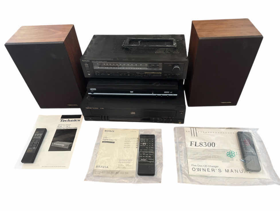 Photo 1 of 130
VINTAGE ASSORTED VIDEO/AUDIO SYSTEMS, TECHNICS AM/FM STERO RECEIVER MODEL SA 130, AMW DVD PLAYER, MP3, DOLBY DIGITAL PLAYER, AND HARMAN/KARDON MODEL FL8300 COMPACT DISC DIGITAL AUDIO, SPEAKER SET