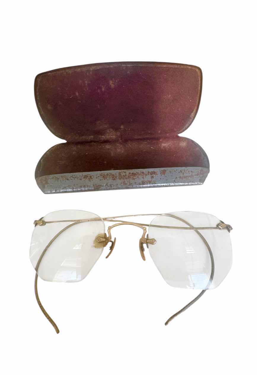 Photo 1 of 150
ANTIQUE WIRE RIM 12K GOLD GLASSES WITH CARRYING CASE. 

GLASSES WHEN FOLDED
L1.75” X W4.75”