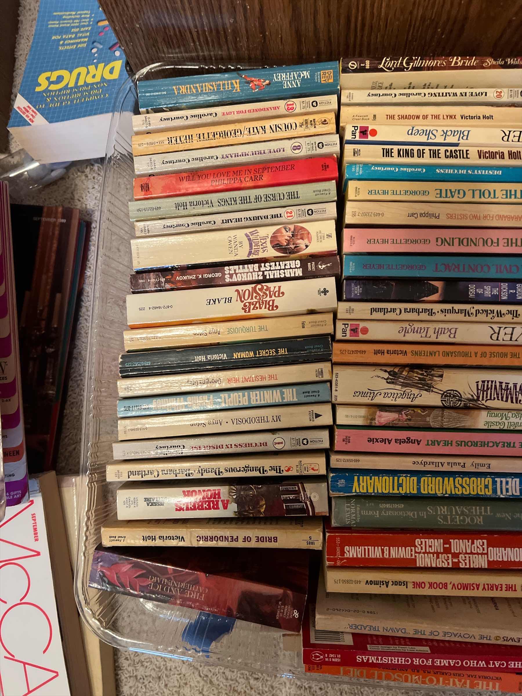 Photo 1 of PLASTIC TRAY WITH COLLECTION PAPERBACK BOOKS