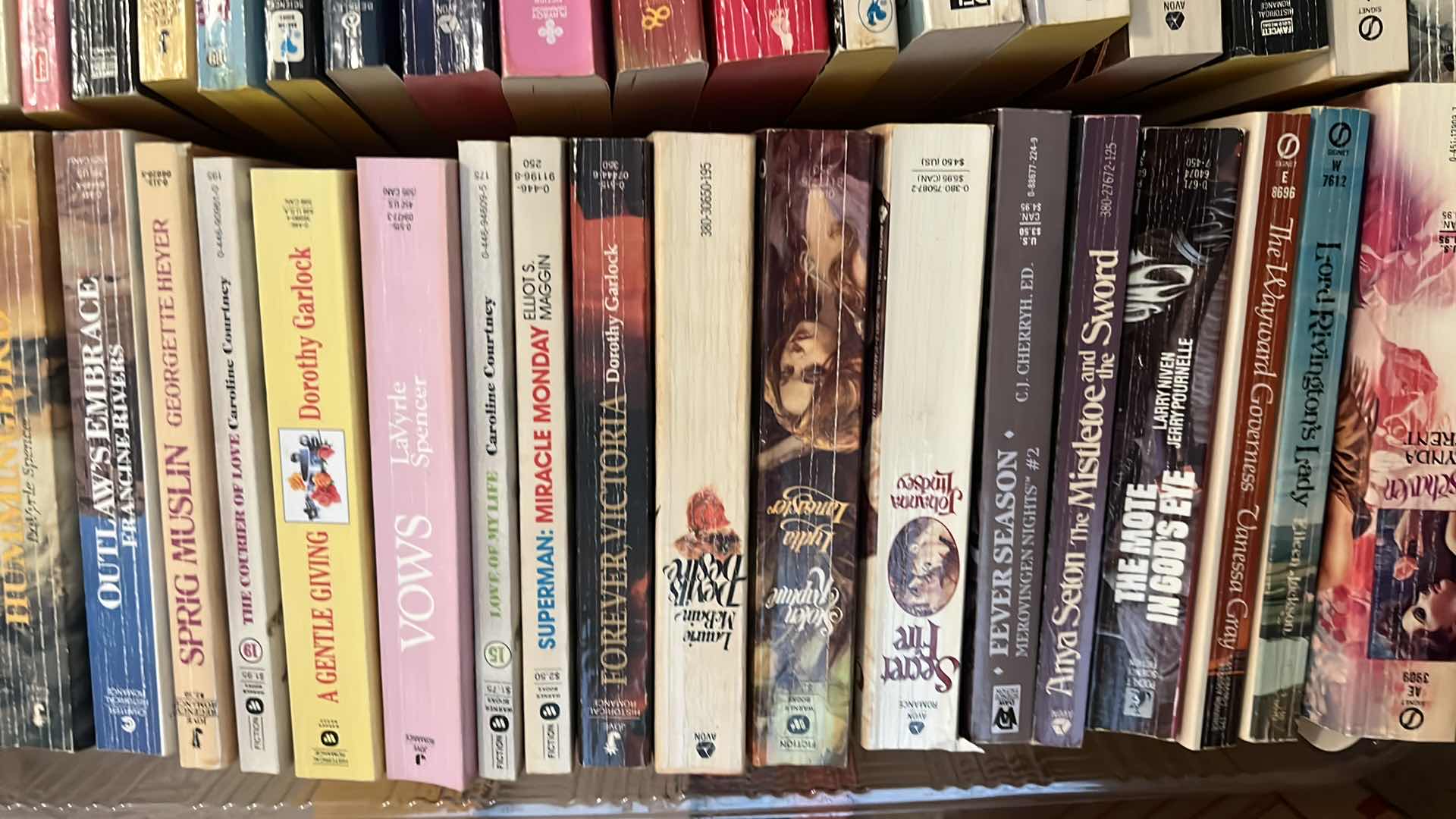 Photo 1 of PLASTIC TRAY OF ROMANCE NOVELS