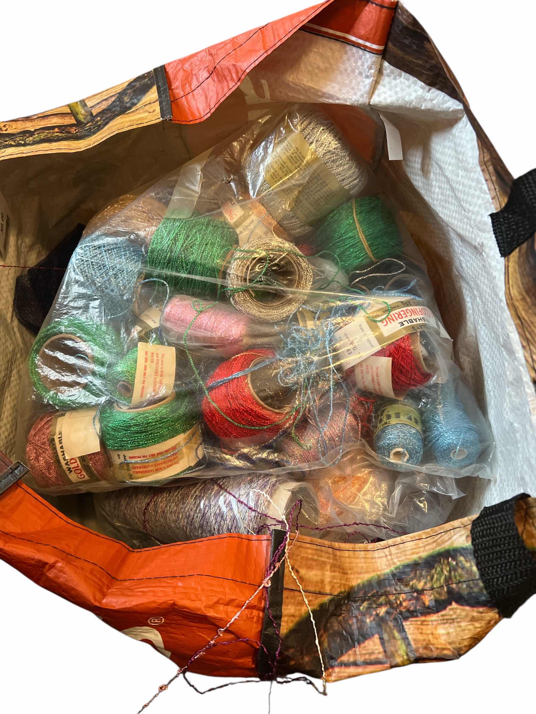 Photo 1 of BAG OF CONES OF THREAD AND SPOOLS OF SHINY METALLIC THREAD