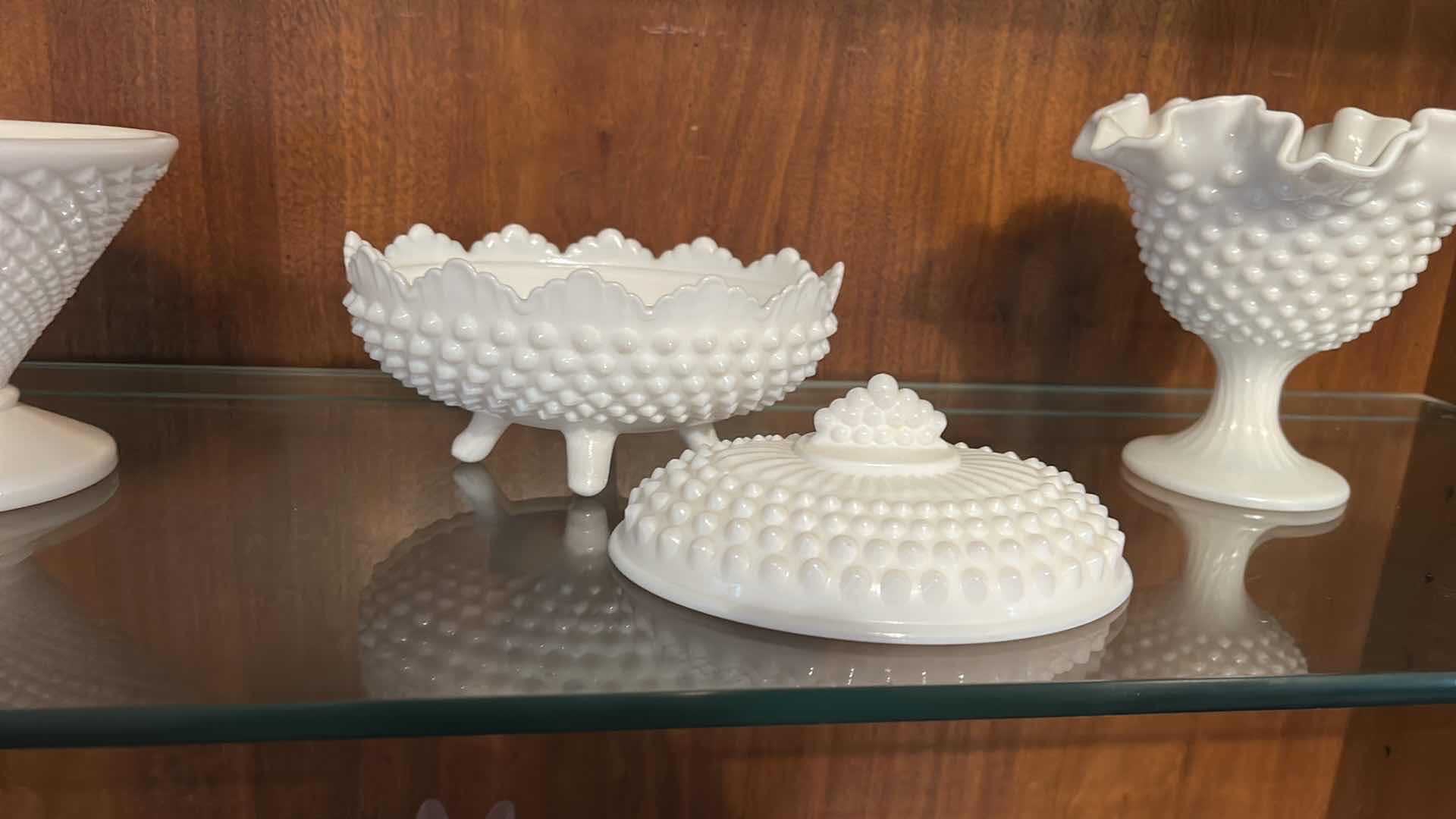 Photo 1 of 3 VINTAGE MILK GLASS PIECES -COMMONLY IDENTIFIED AS FENTON HOBNAIL. COVERED CANDY DISH, A RUFFLED VASE, AND A FOOTED COMPOTE BOWL, ALL SHOWCASING THE SIGNATURE RAISED DOT PATTERN.