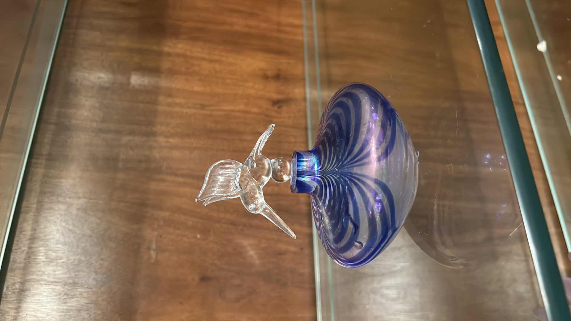 Photo 1 of VINTAGE ART GLASS PERFUME BOTTLE FEATURING A CLEAR GLASS HUMMINGBIRD STOPPER. H4.5”