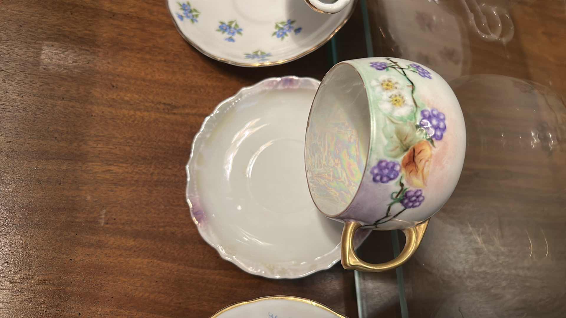 Photo 1 of 4 VINTAGE PORCELAIN CUP AND SAUCER SETS