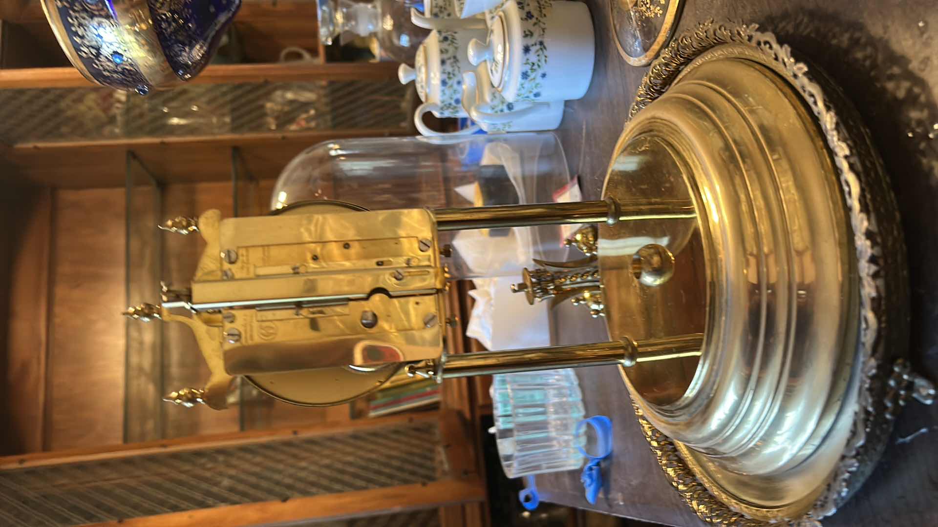 Photo 1 of VINTAGE KUNDO (KIENINGER & OBERGFELL) 400-DAY ANNIVERSARY TORSION CLOCK MANUFACTURED IN WEST GERMANY, FEATURING BRASS CONSTRUCTION AND A PROTECTIVE GLASS DOME. H11.5”