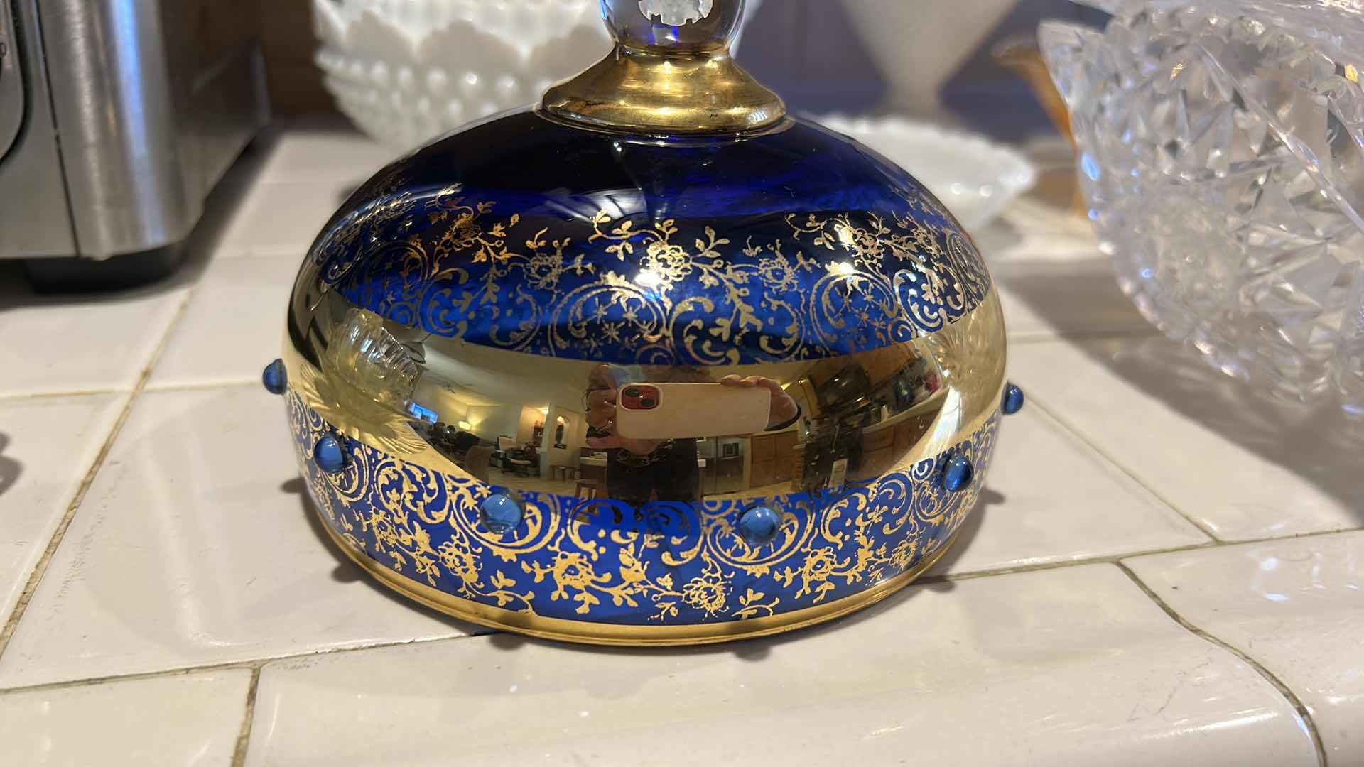 Photo 1 of 2 VINTAGE BOHEMIAN-STYLE COBALT AND GILT ART GLASS PEDESTAL COMPOTE / GOBLET, FEATURING HEAVY GOLD ENCRUSTED FLORAL DECORATION WITH COBALT BLUE JEWELED CABOCHON ACCENTS, CLEAR STEM, AND GILT FOOT, APPROX. H13” & BOHEMIAN CZECH COBALT BLUE GLASS BOWL,