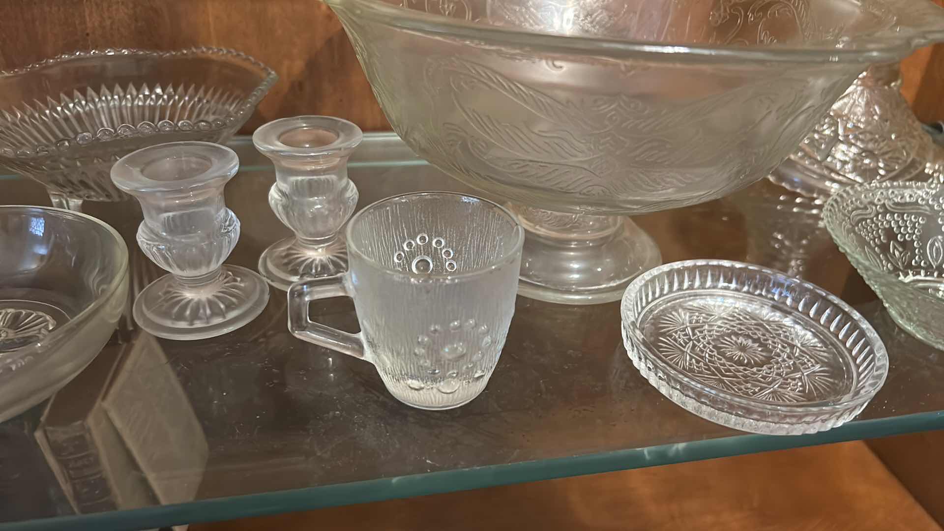 Photo 1 of COLLECTION OF VINTAGE GLASSWARE, FEATURING VARIOUS CLEAR PRESSED GLASS ITEMS SUCH AS A CENTRAL PEDESTAL PUNCH BOWL, SMALLER FOOTED COMPOTES, SERVING BOWLS, AND MUG