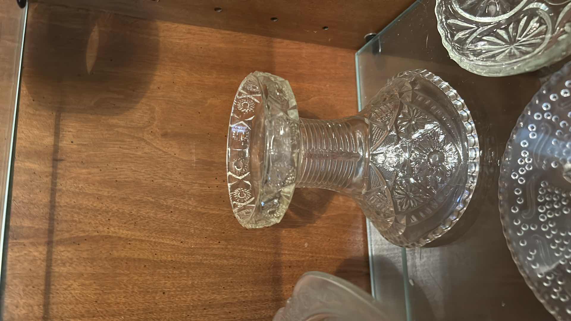 Photo 1 of COLLECTION OF VINTAGE GLASSWARE, FEATURING VARIOUS CLEAR PRESSED GLASS ITEMS SUCH AS A CENTRAL PEDESTAL PUNCH BOWL, SMALLER FOOTED COMPOTES, SERVING BOWLS, AND MUG