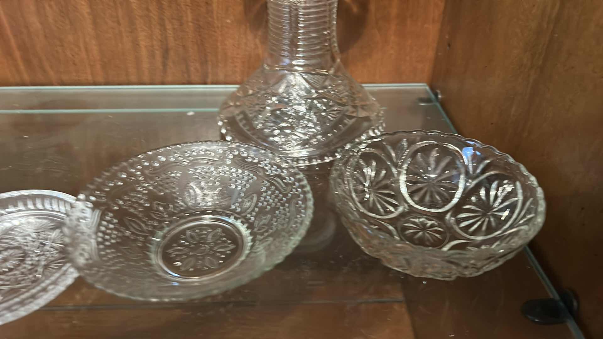 Photo 1 of COLLECTION OF VINTAGE GLASSWARE, FEATURING VARIOUS CLEAR PRESSED GLASS ITEMS SUCH AS A CENTRAL PEDESTAL PUNCH BOWL, SMALLER FOOTED COMPOTES, SERVING BOWLS, AND MUG