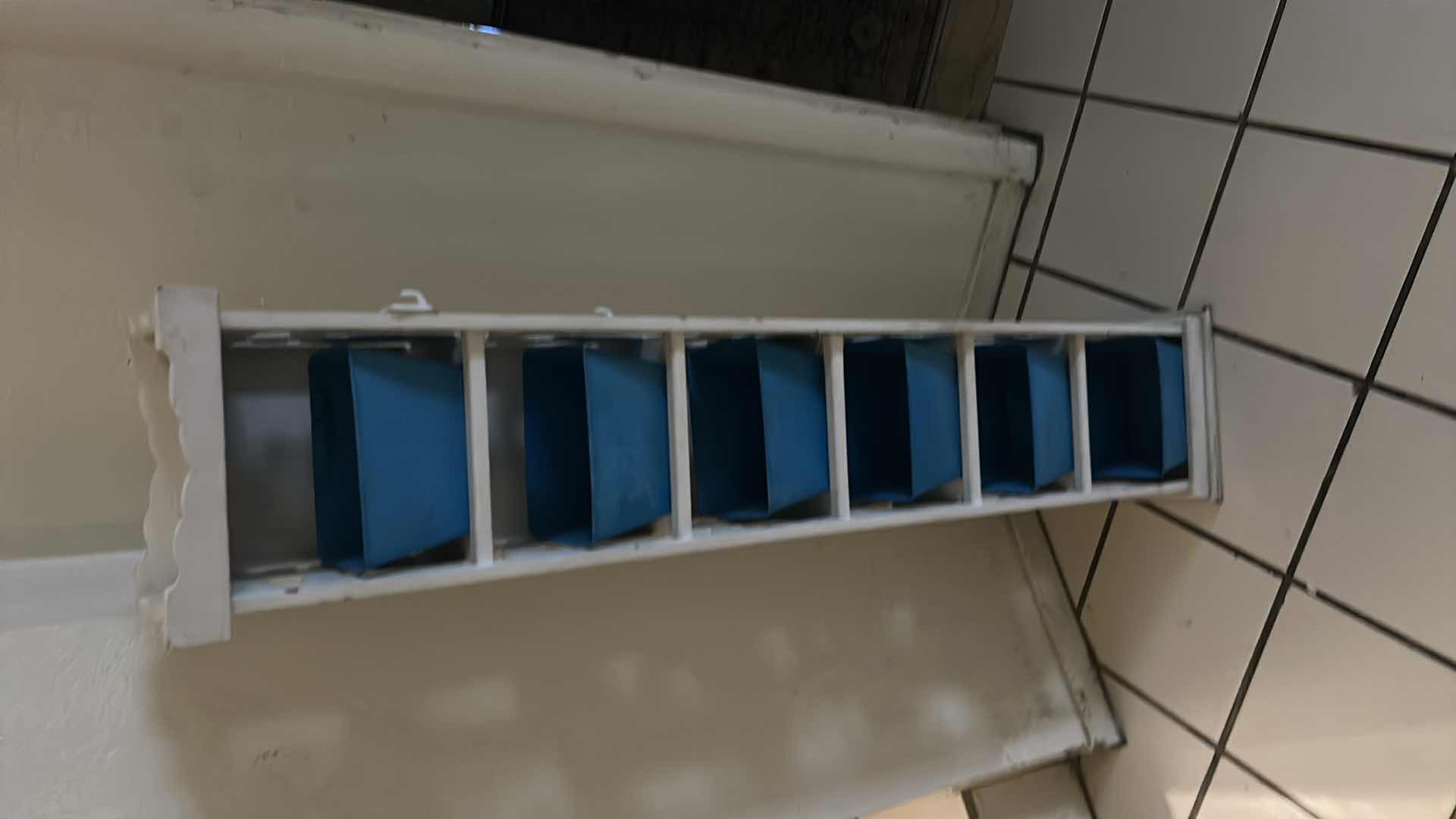Photo 1 of NARROW STORAGE CABINET- WOOD WITH PLASTIC TOTES 7 1/2 x 7 1/2” x H38 1/2