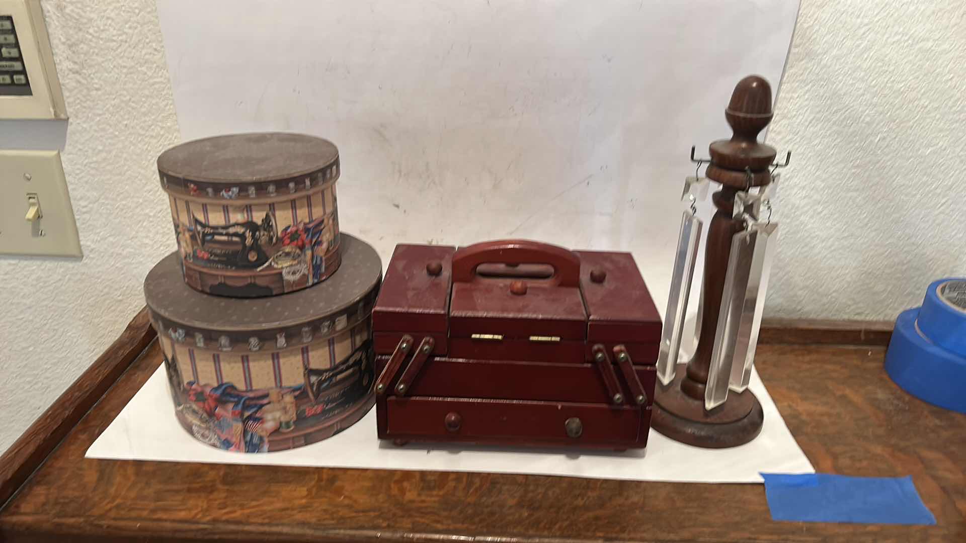 Photo 1 of VINTAGE ITEMS- 2 ROUND STORAGE BOXES, JEWELRY BOX & WOODEN STAND H11.5”