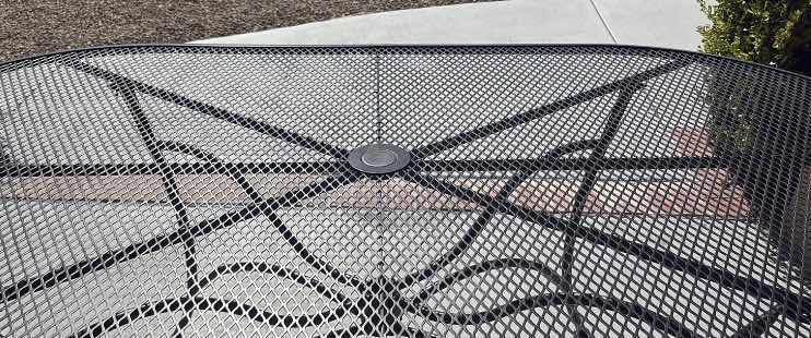 Photo 1 of HAMPTON BAY NANTUCKET BLACK METAL OUTDOOR PATIO TABLE E/DURABLE MESH TOP & CENTRAL UMBRELLA HOLE 76”X42”X28.5”