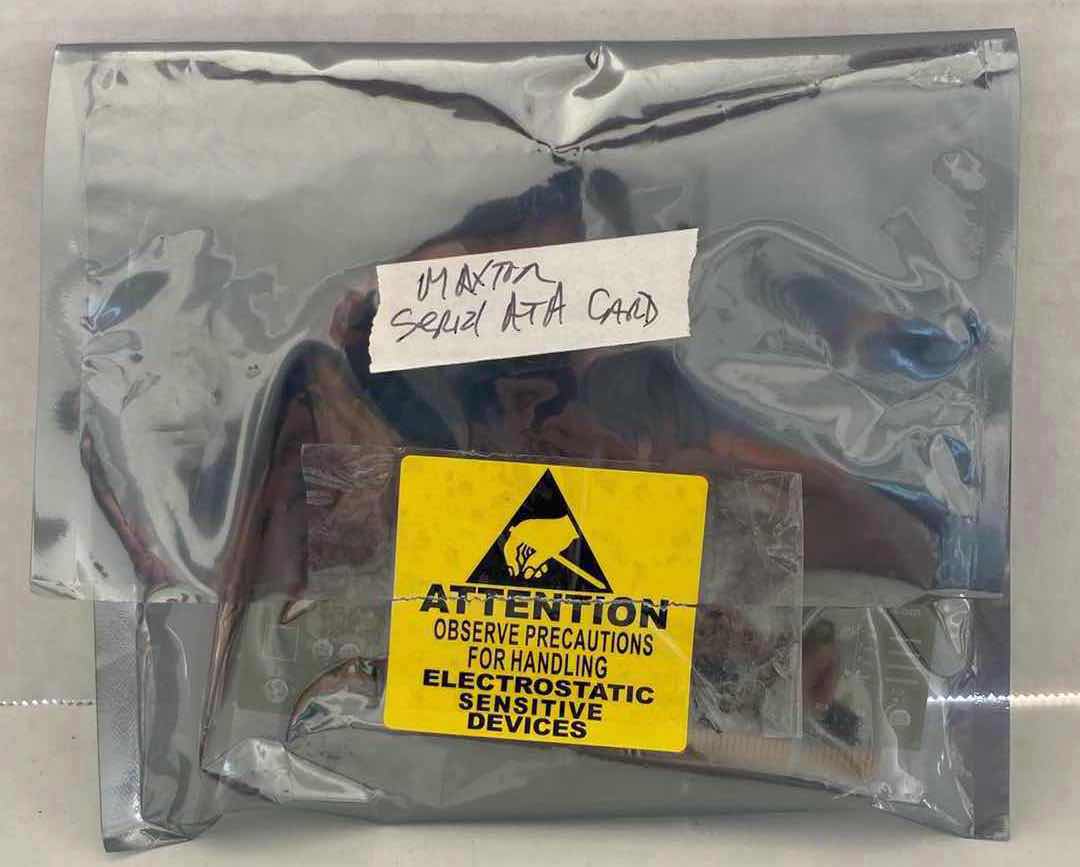 Photo 1 of NEW MAXTOR SATA/150 PCI CONTROLLER CARD