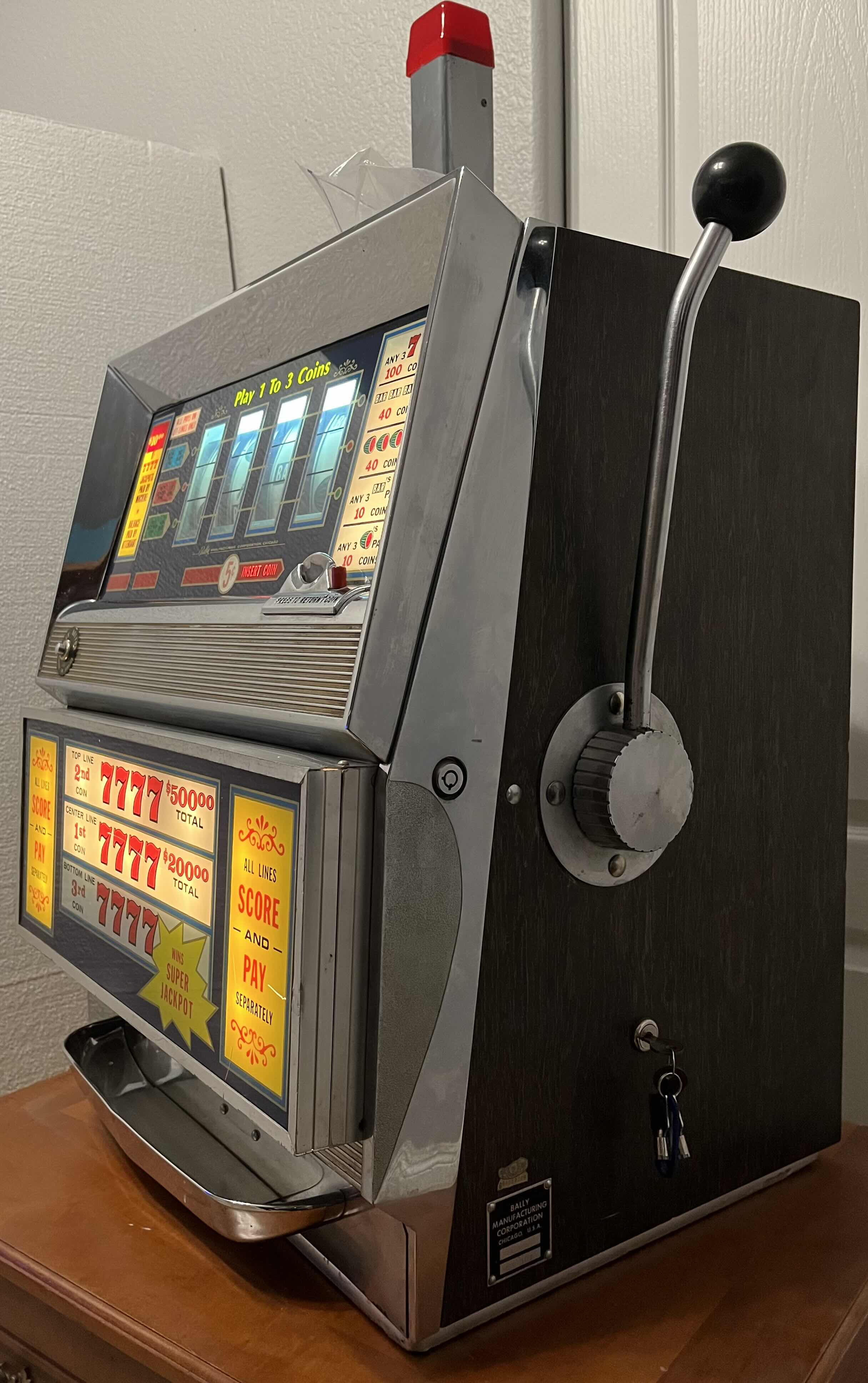 Photo 1 of BALLY CORP. CASINO 5 CENT NICKEL 4 REEL SLOT MACHINE MODEL 989-5