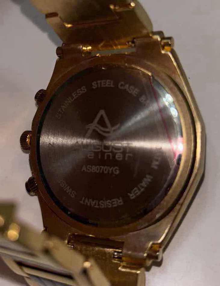 Photo 1 of AUGUST STEINER SWISS QUARTZ WATER RESISTANT WATCH W STAINLESS STEEL BACK W EXTRA LINKS/TOOLS (AS8070YG)