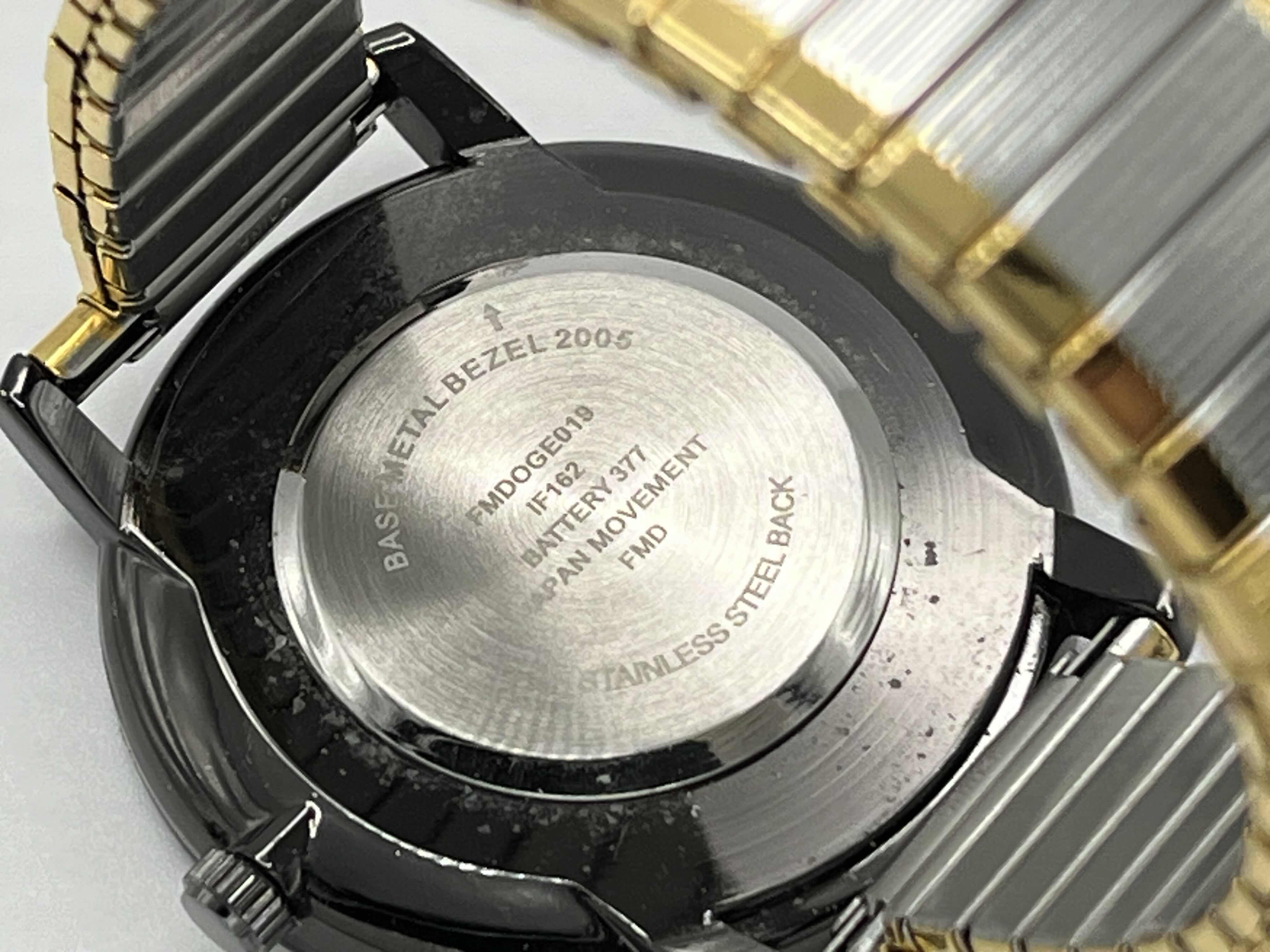 Photo 1 of GEORGE GUNMETAL CASE BLUE DIAL W SILVER & GOLD FINISH STAINLESS STEEL ELASTIC BAND MENS WATCH SIZE S-M MODEL FMDOGE019