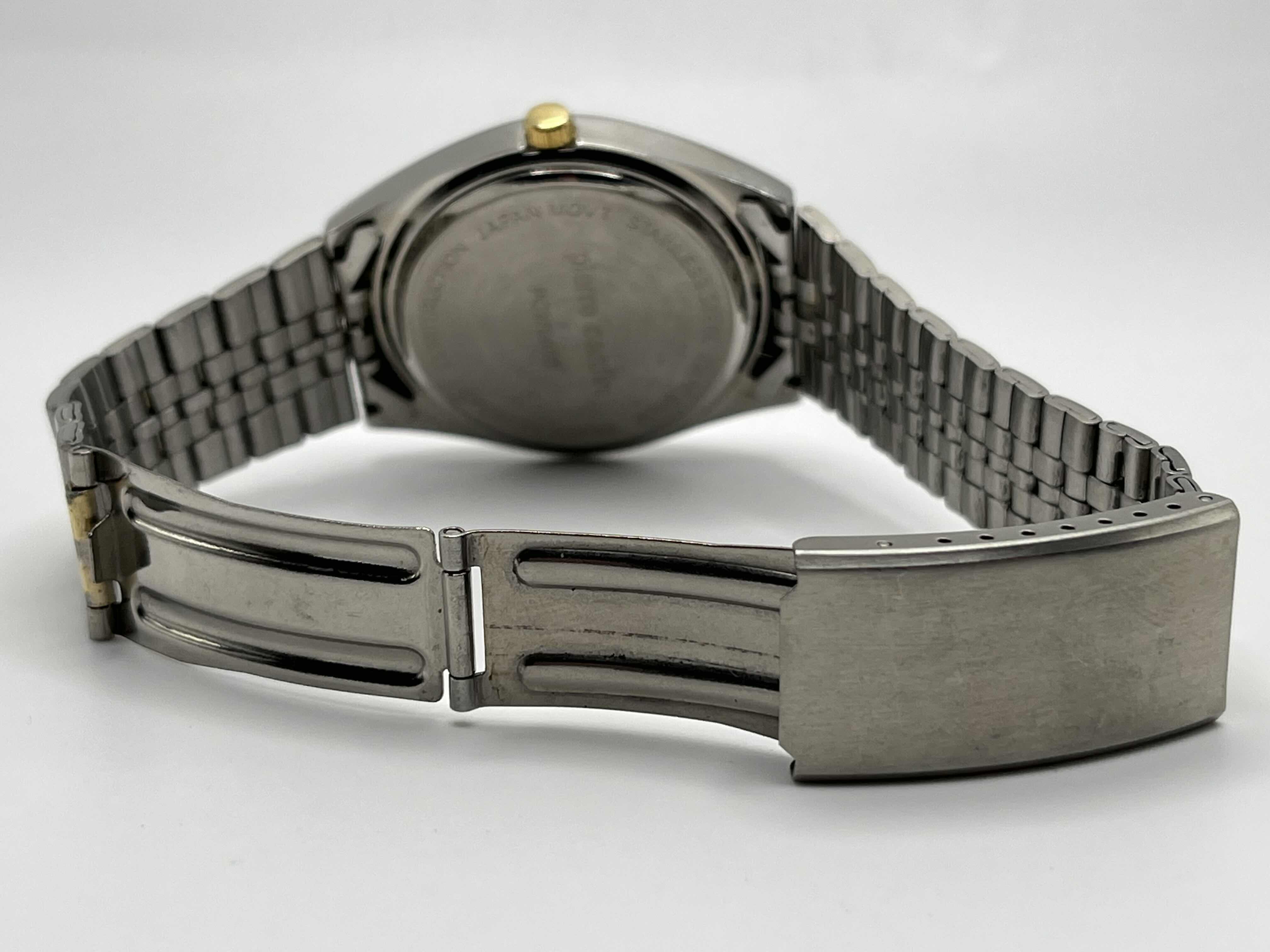 Photo 1 of PIERRE CARDIN W SILVER & GOLD FINISH STAINLESS STEEL BAND MENS WATCH SIZE S-M MODEL PC2706TC