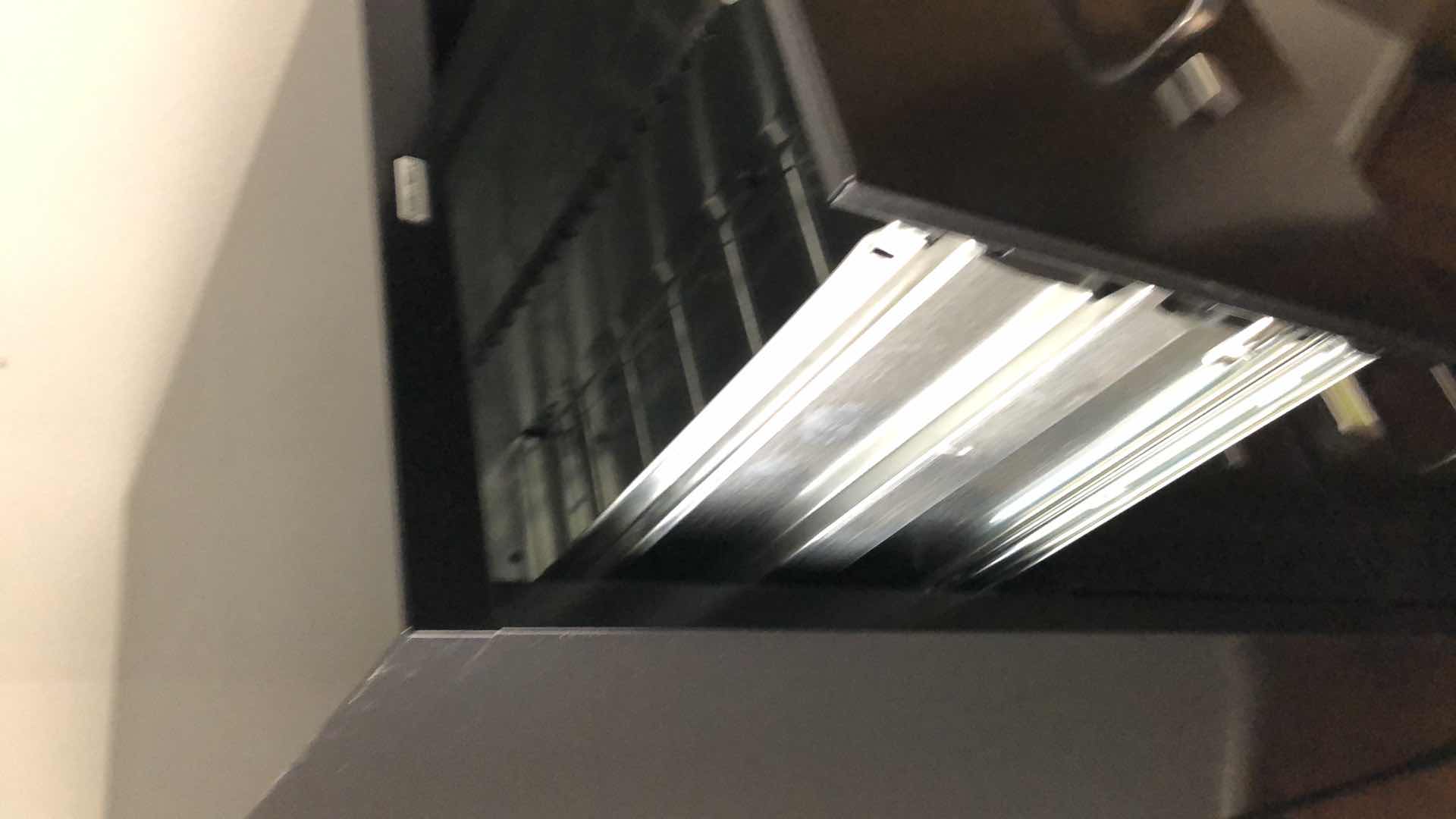 Photo 1 of METAL FILING CABINET ON WHEELS 15” X 25” H 55”