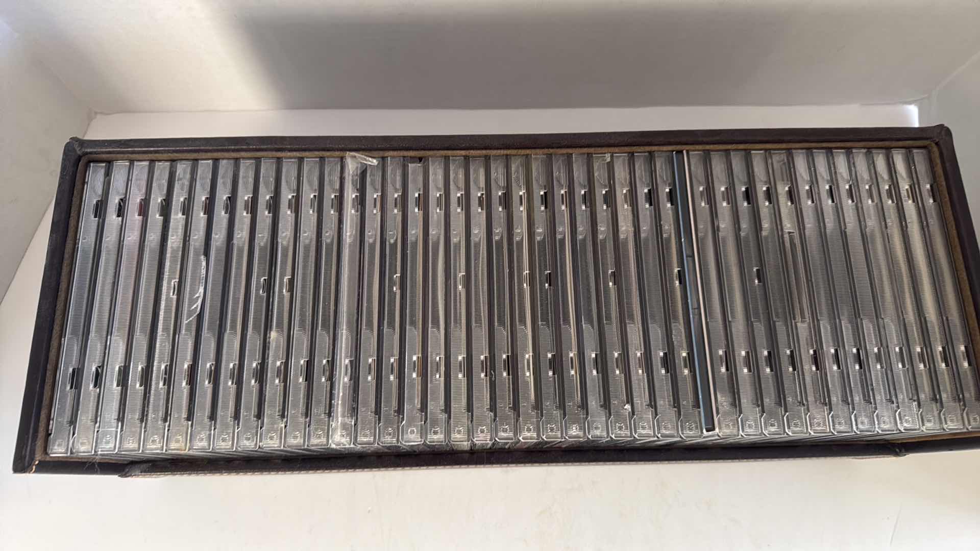 Photo 1 of ASSORTED CDS, VARIOUS ARTISTS IN LEATHER CASE