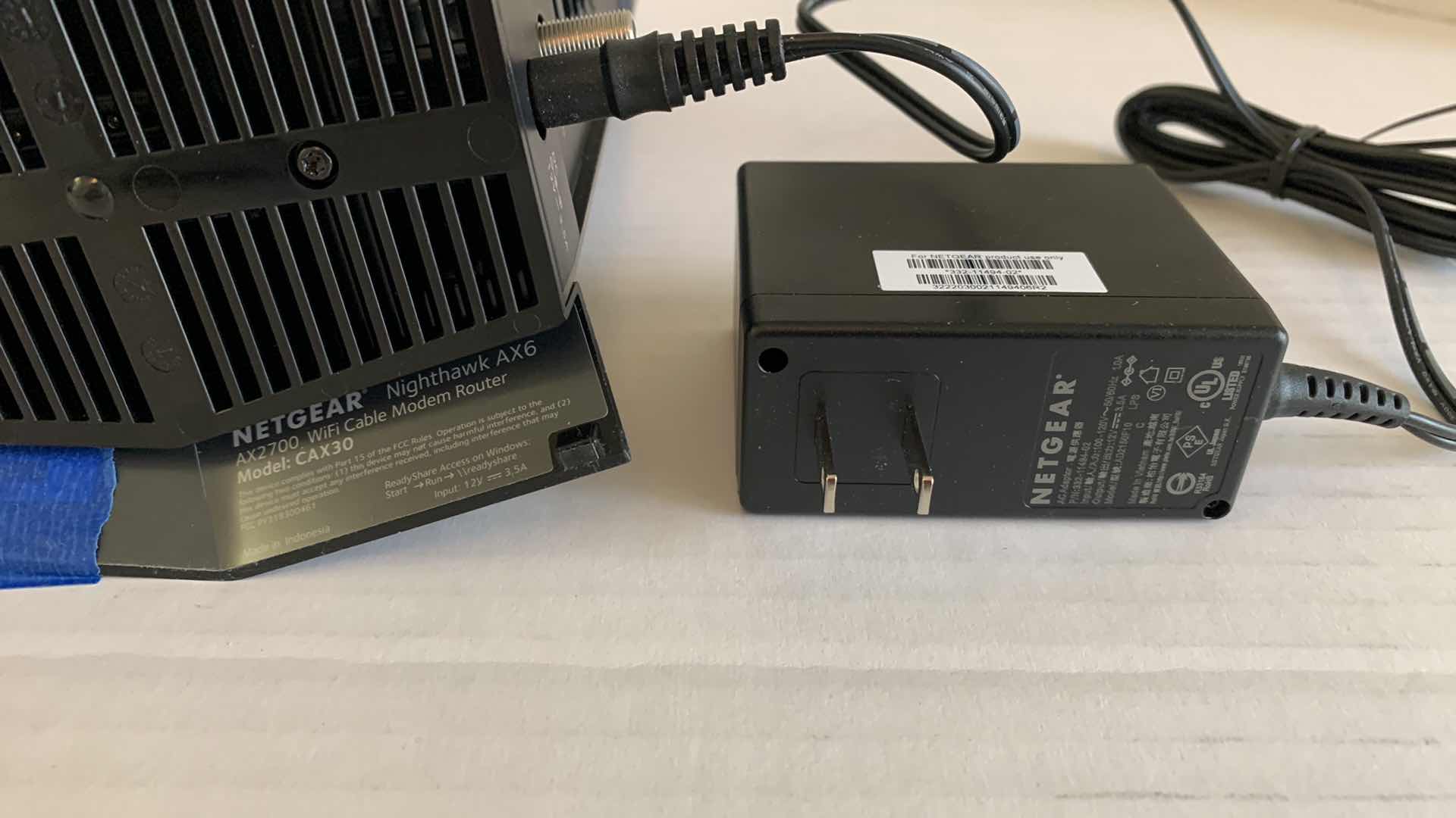 Photo 1 of NETGEAR NIGHTHAWK CAX30 DOCSIS 3.1 CABLE MODEM WIFI 6 ROUTER AX2700 2.7 GBPS