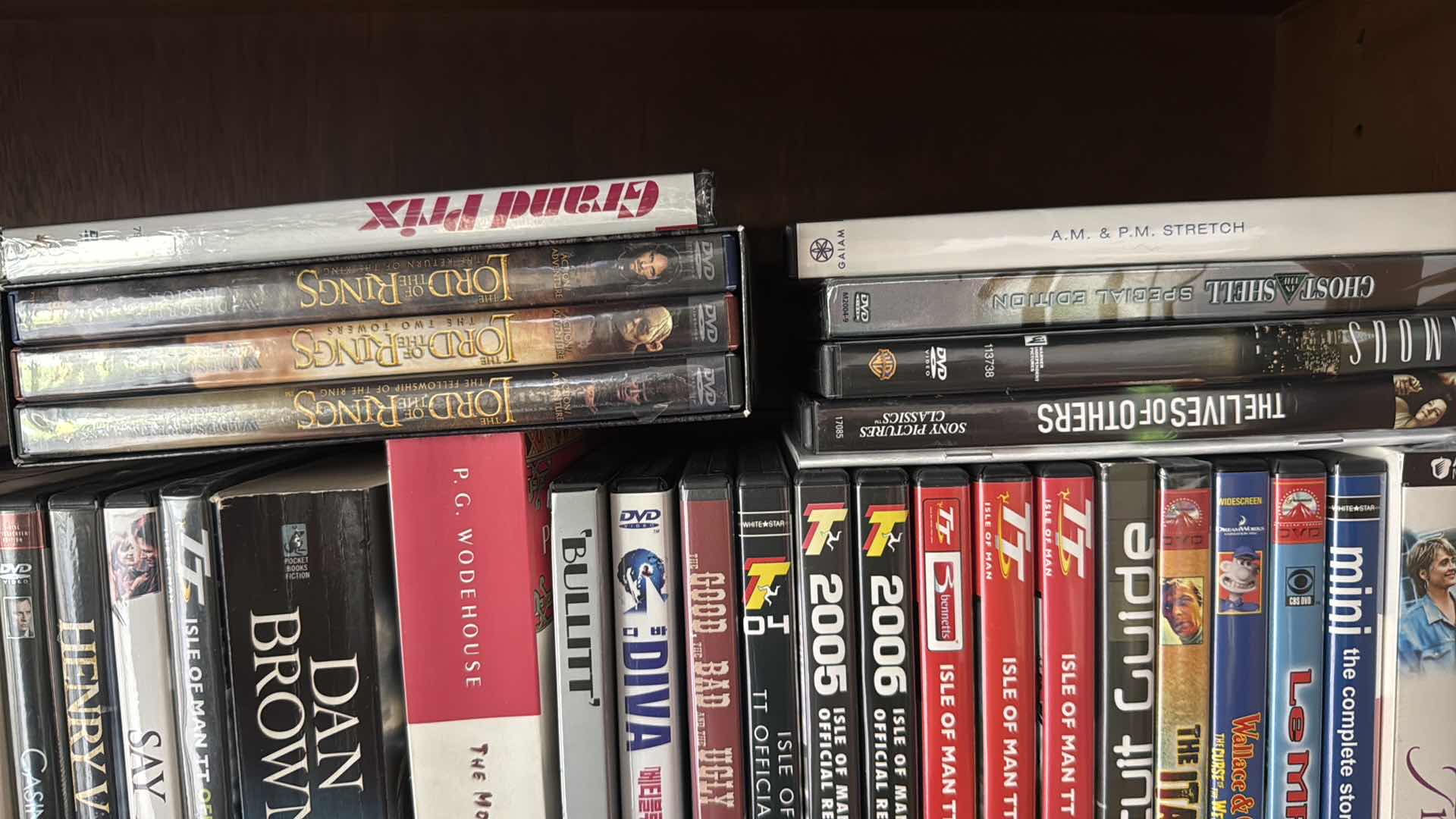 Photo 1 of ASSORTED DVDS - VARIOUS TITLES IN LEATHER CASE