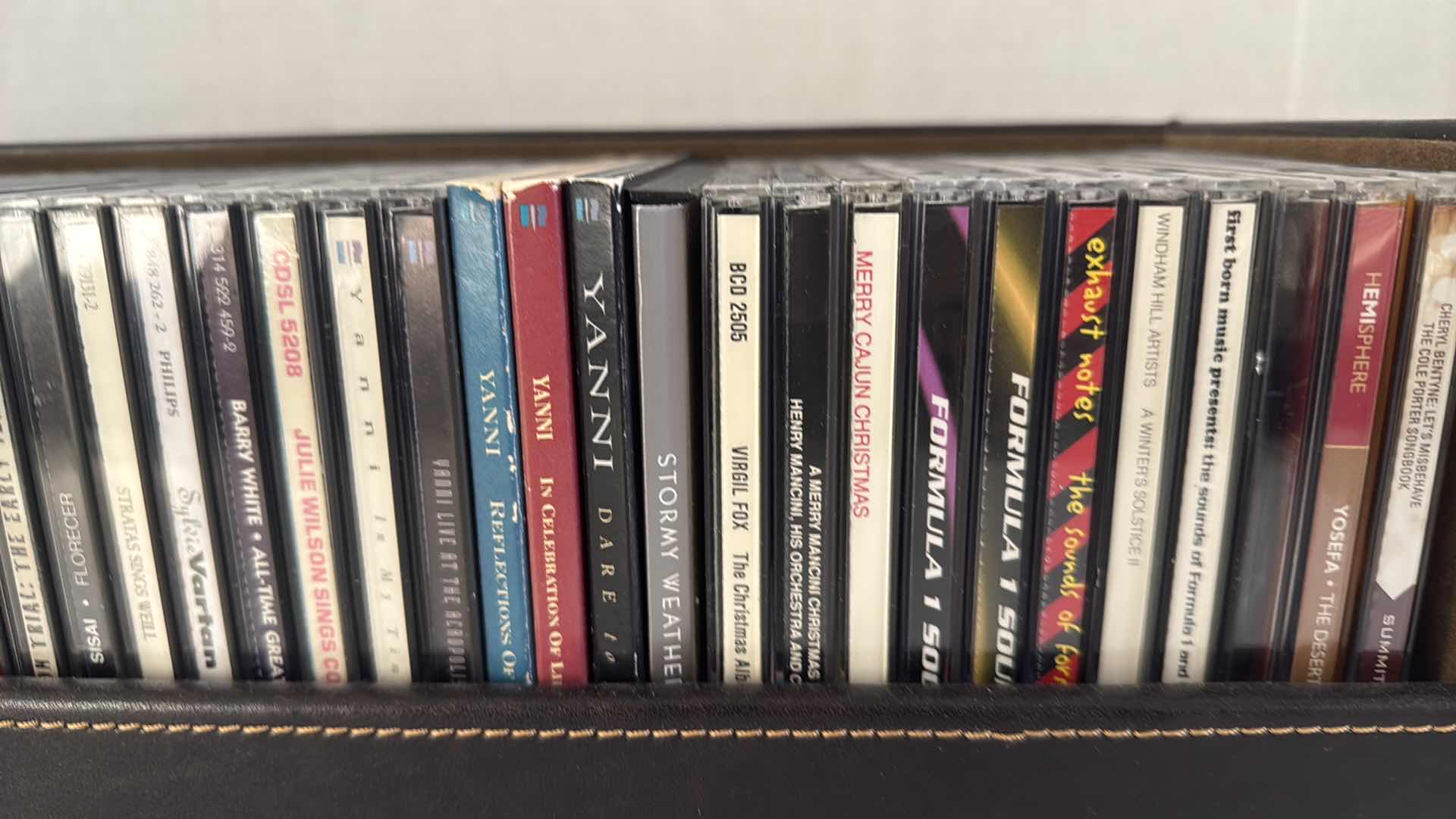 Photo 1 of ASSORTED CDS, VARIOUS ARTISTS IN LEATHER CASE