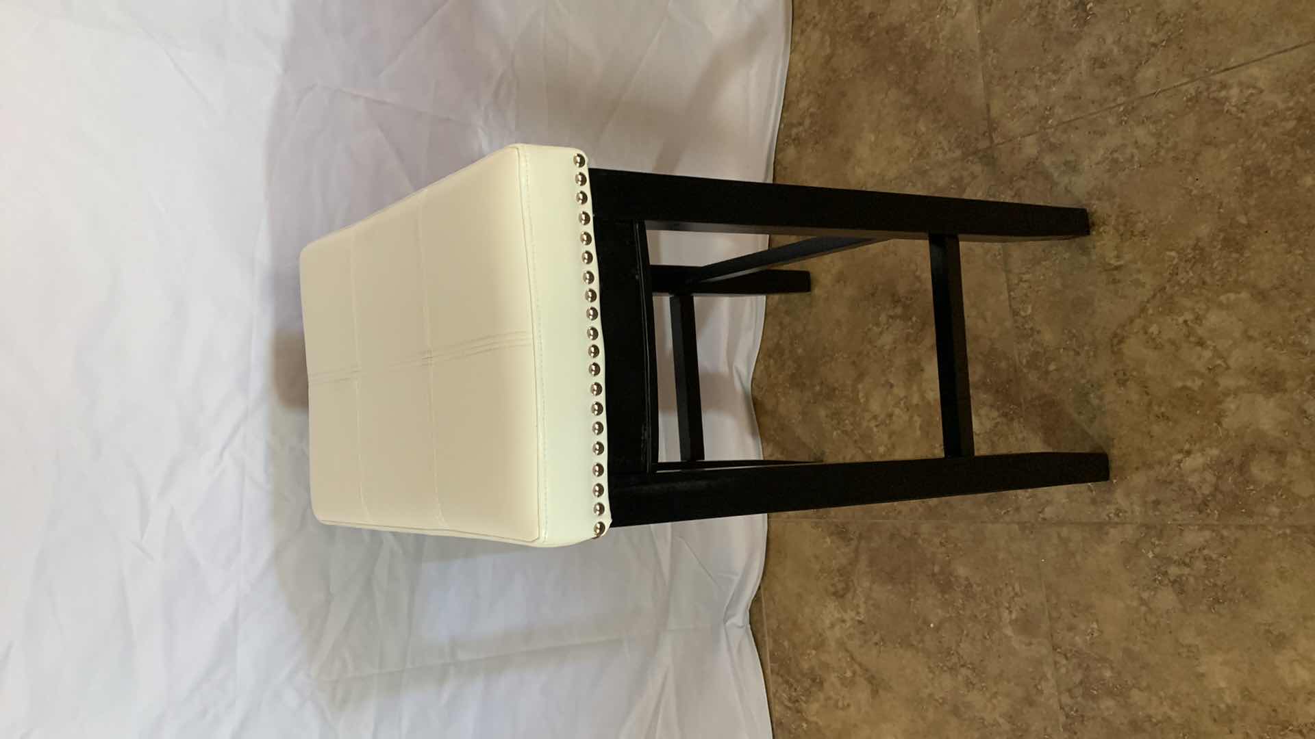 Photo 1 of  BACKLESS COUNTER STOOL WITH NAILHEAD TRIM32” TALL