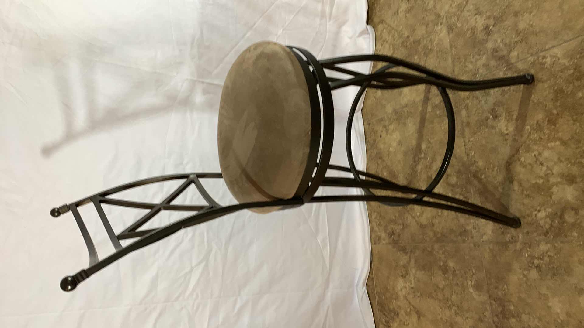 Photo 1 of METAL BAR SWIVEL STOOL 45” TALL