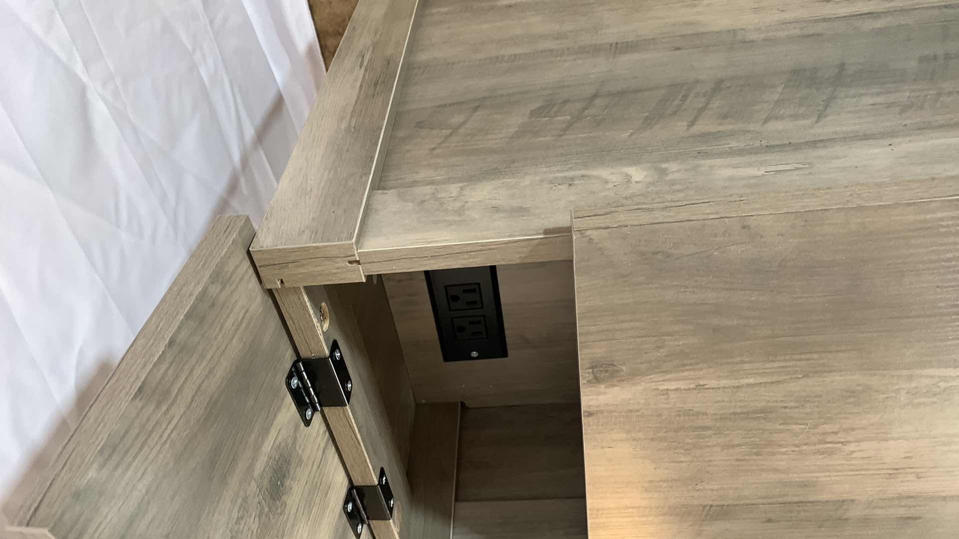 Photo 1 of NARROW WOODEN END TABLE WITH USB CHARGING STATION AND ELECTRICAL OUTLETS AND STORAGE AREA 13” X 24” H 24”