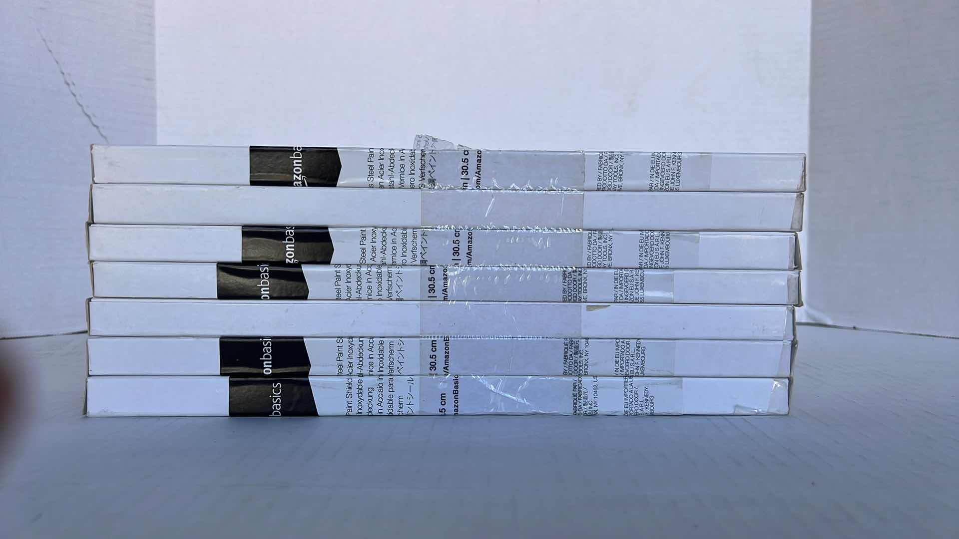 Photo 2 of AMAZON BASICS 12” STAINLESS STEEL PAINT SHIELD LOT 7