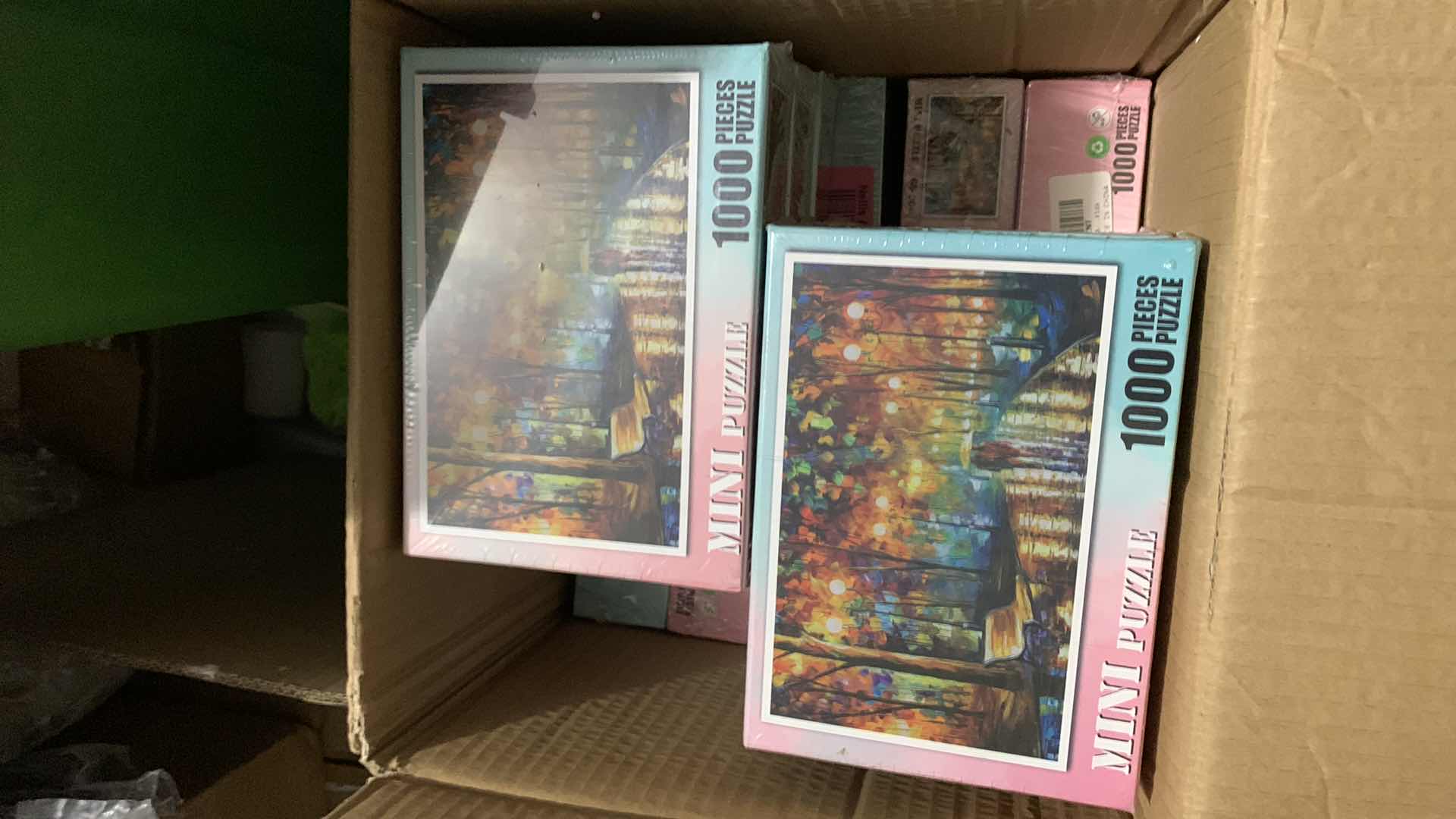 Photo 1 of BOX OF PUZZLES