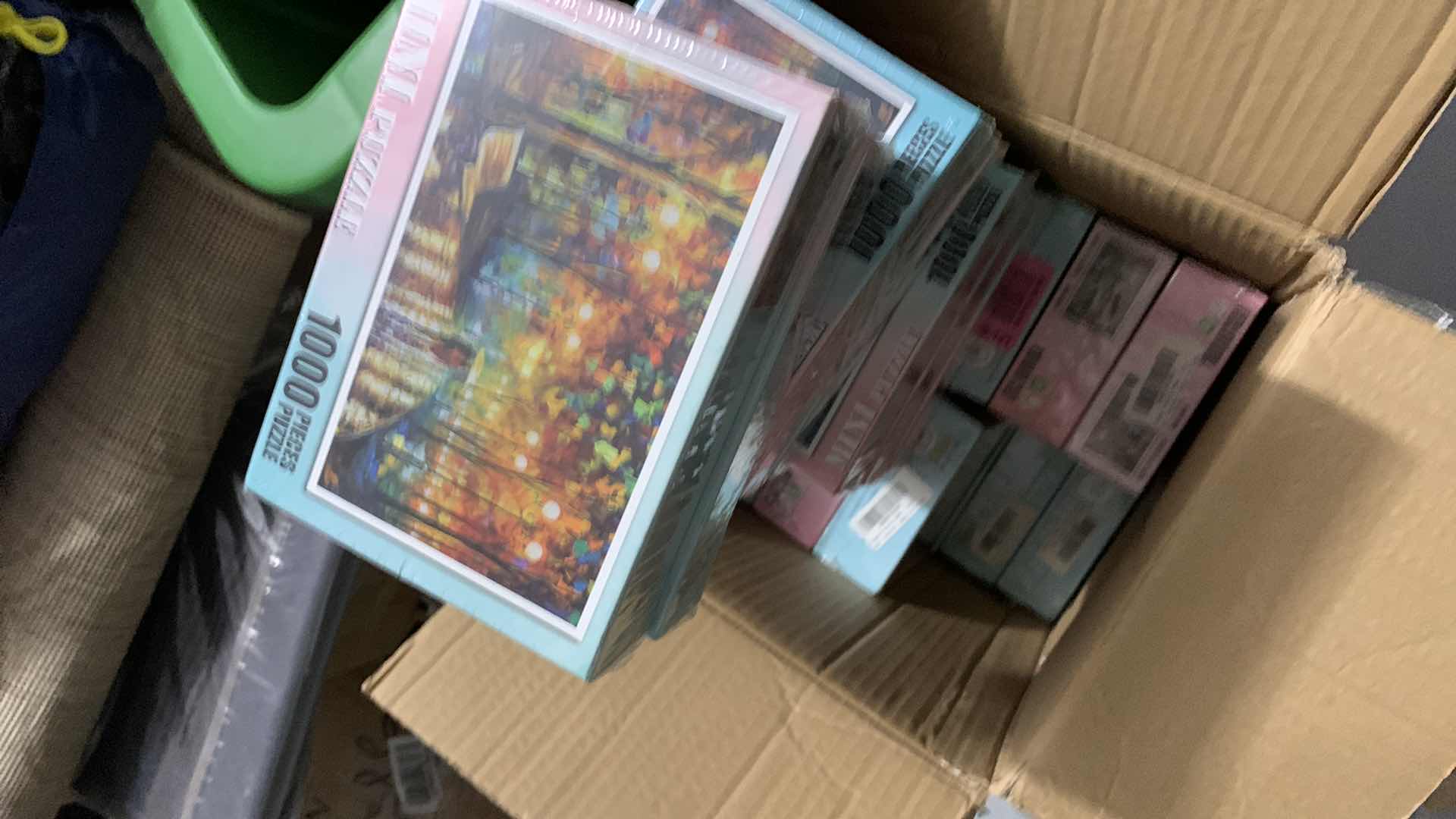 Photo 1 of BOX OF PUZZLES