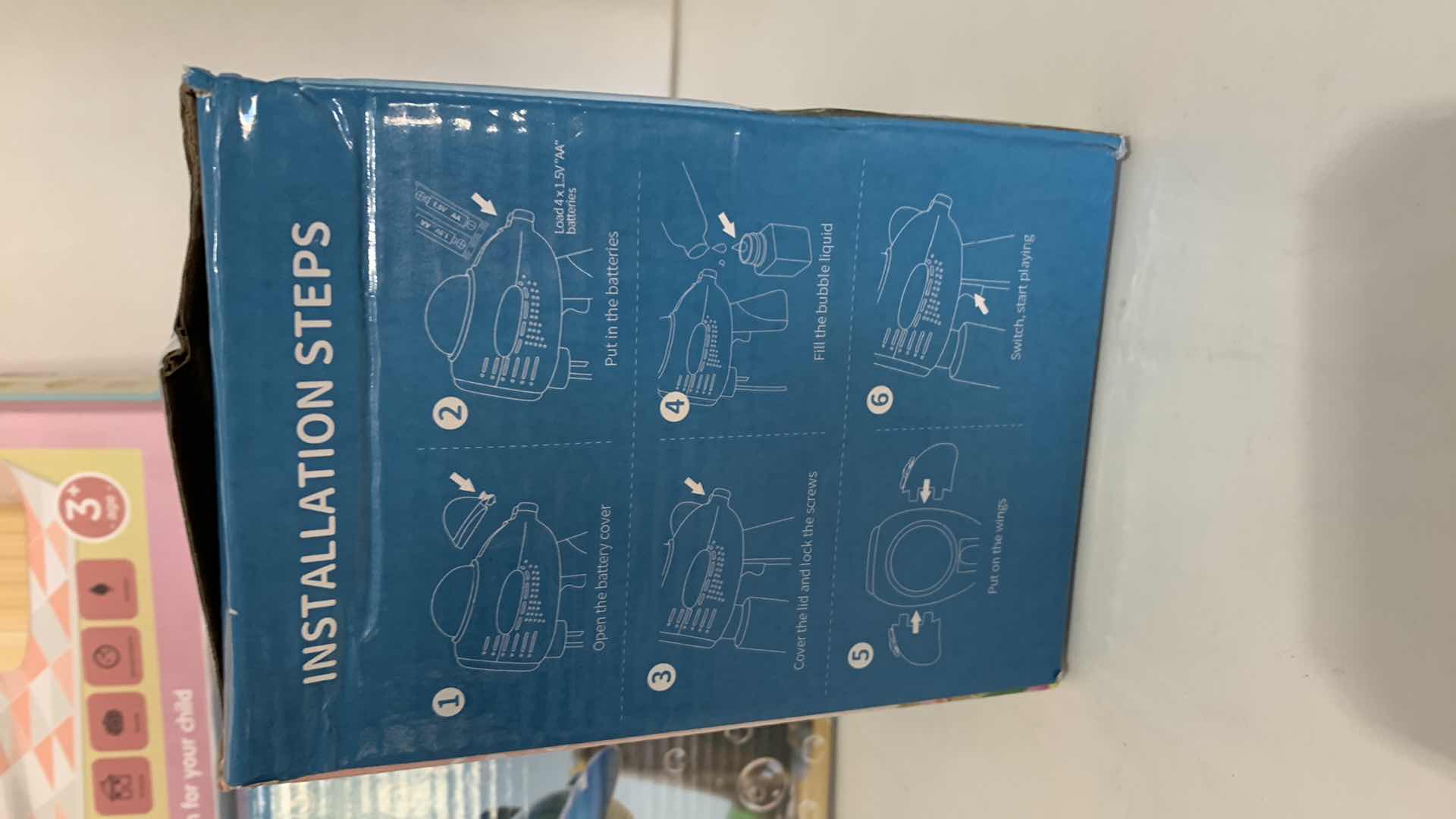 Photo 1 of 3-AIRCRAFT BUBBLE GUNS AND A PLAYHOUSE ICE CREAM SET UP