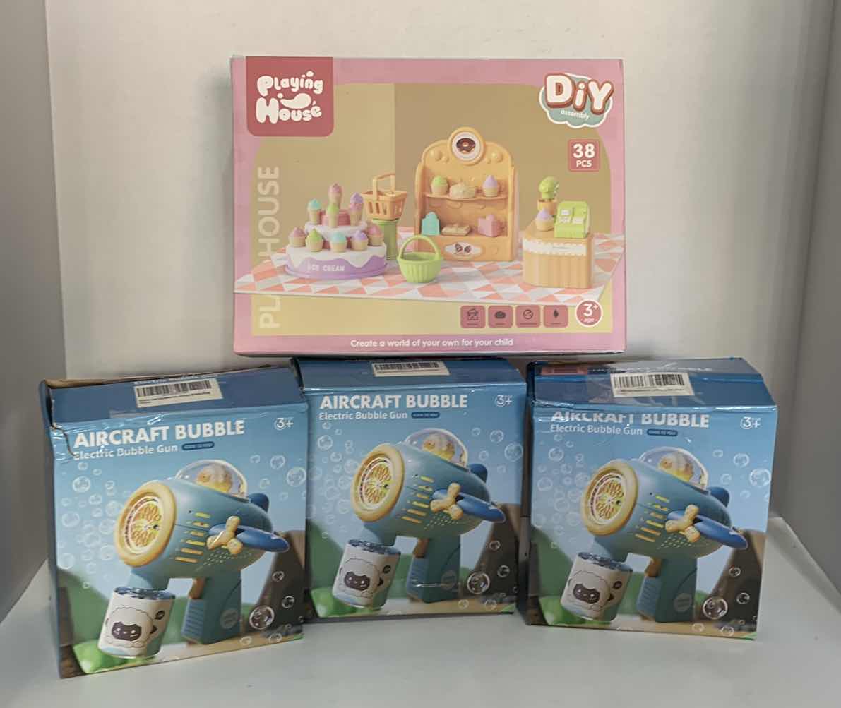 Photo 1 of 3-AIRCRAFT BUBBLE GUNS AND A PLAYHOUSE ICE CREAM SET UP