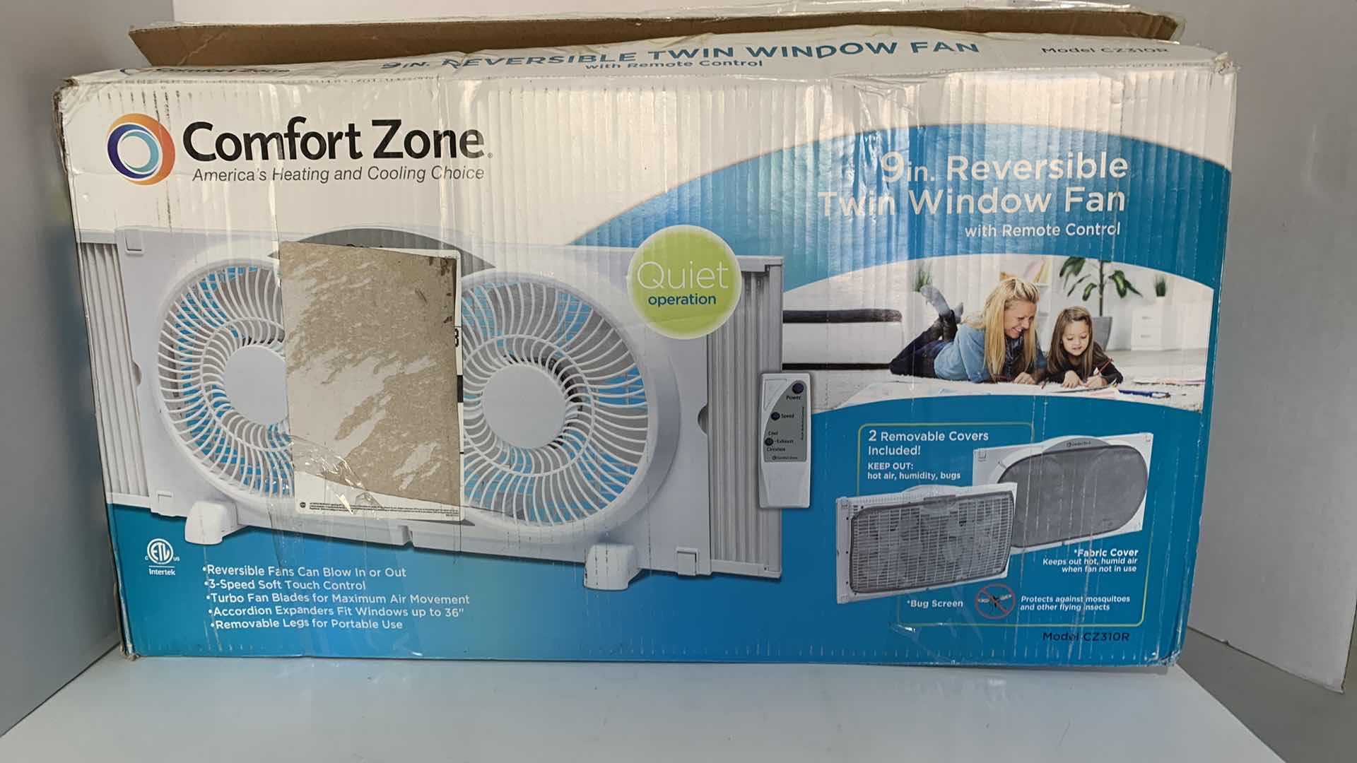 Photo 1 of COMFORT ZONE 9” REVERSIBLE TWIN WINDOW FAN