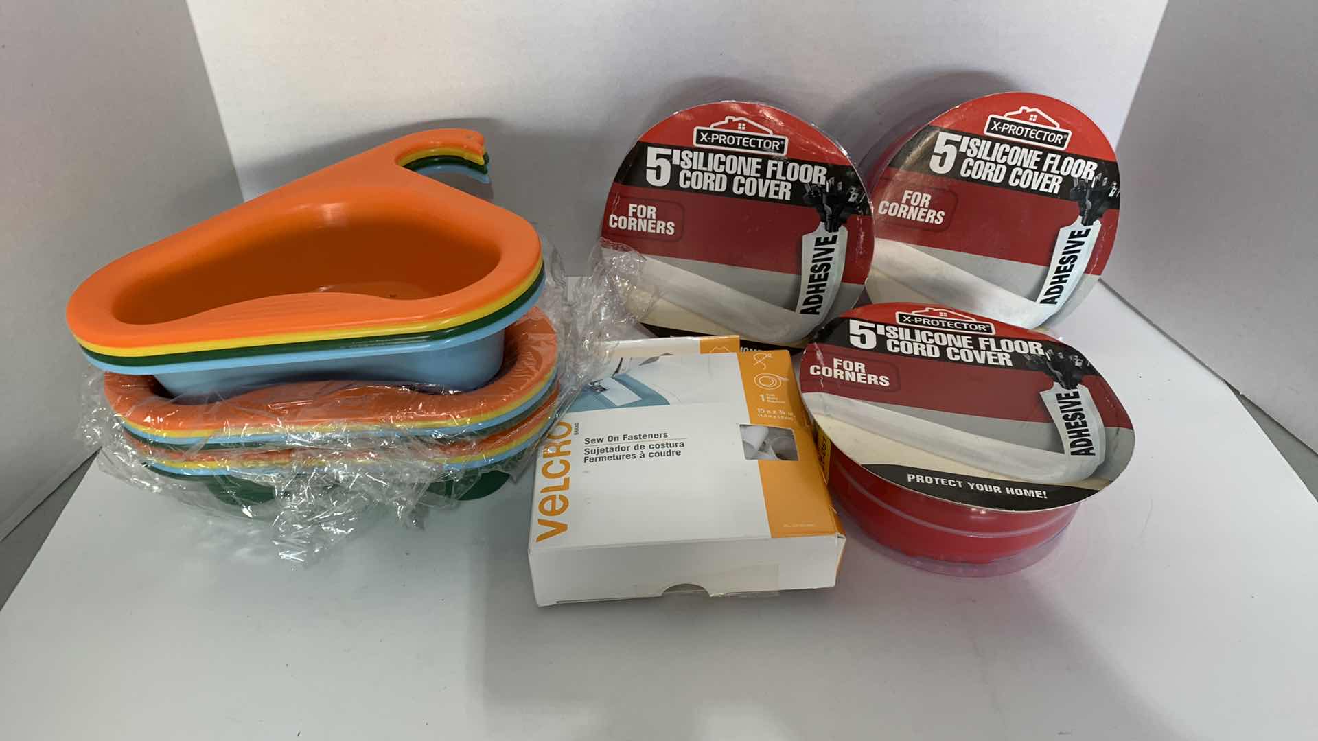 Photo 1 of 3-FLOOR CORD COVERS, KITCHEN FAUCET BASKETS AND SEW ON FASTENERS