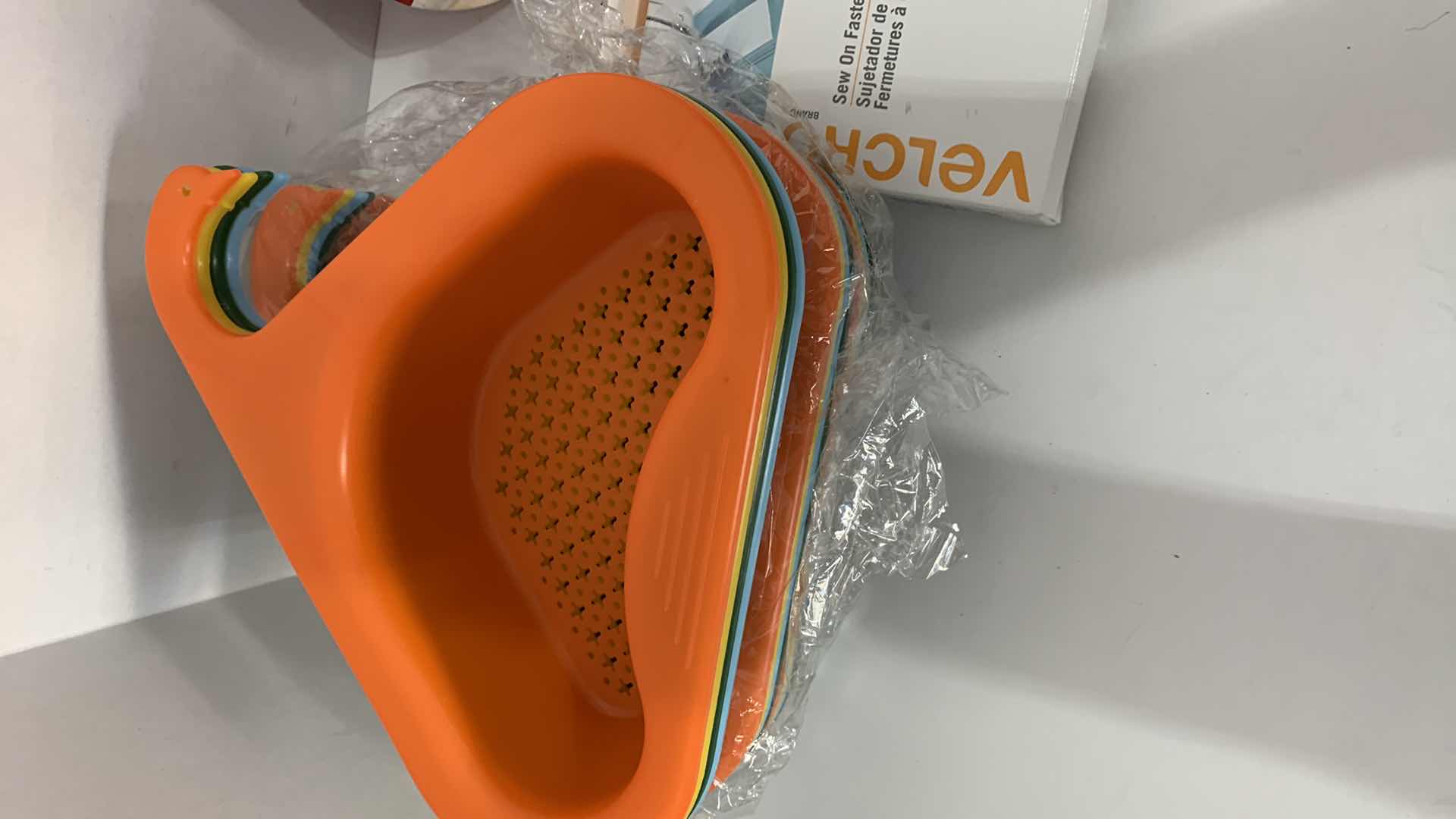 Photo 2 of 3-FLOOR CORD COVERS, KITCHEN FAUCET BASKETS AND SEW ON FASTENERS